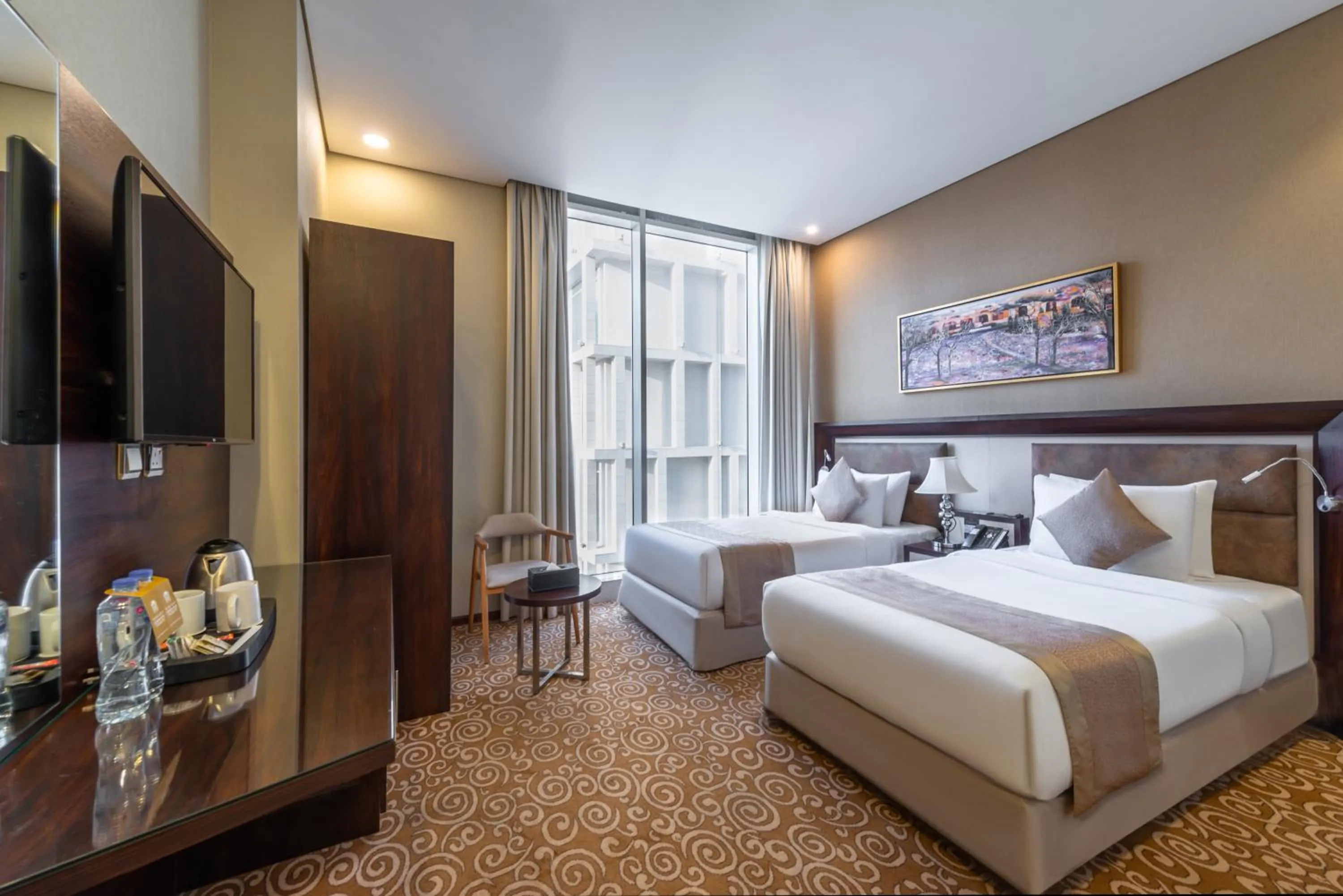 Bed in Crown Rose Al Sahafa Hotel