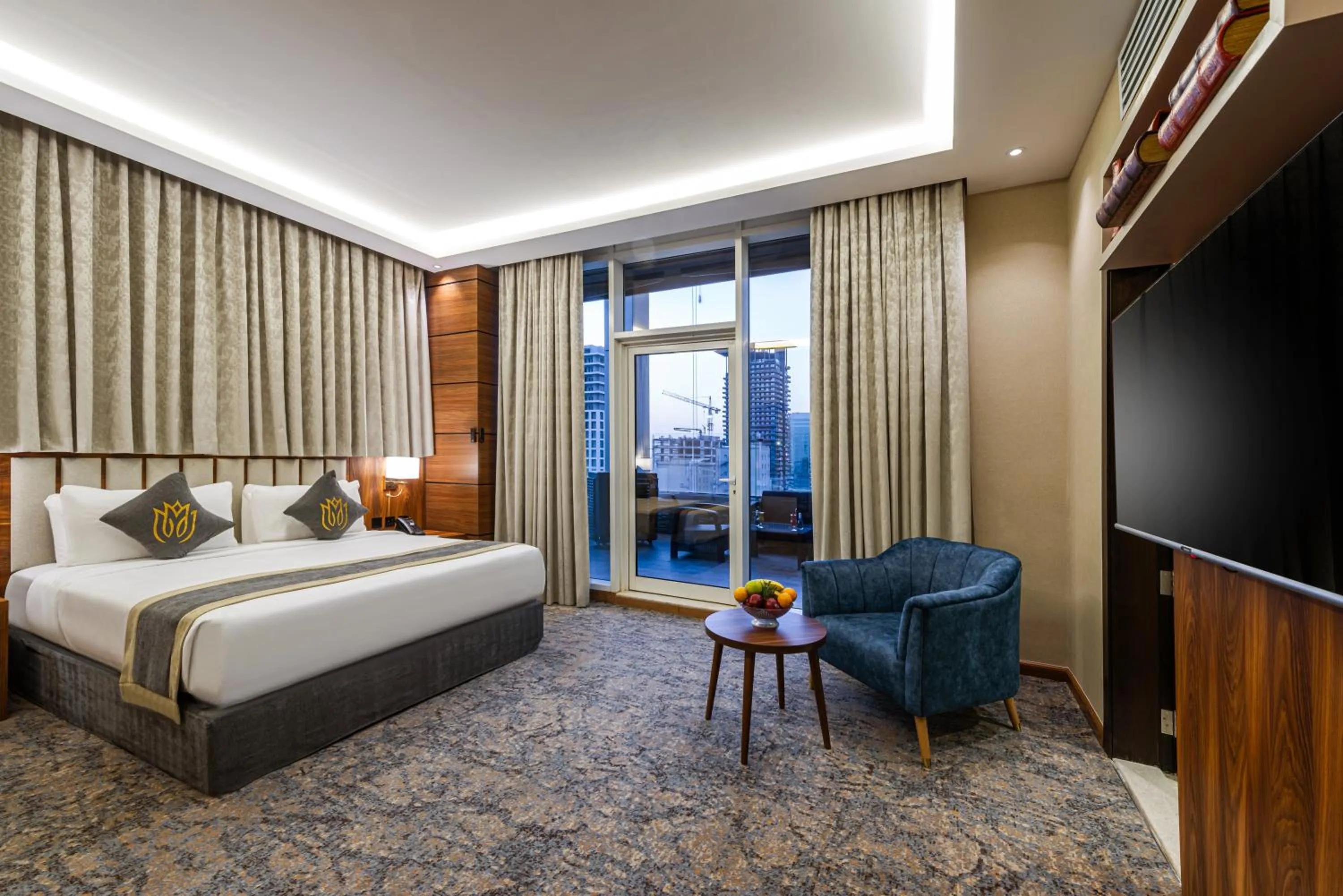 Bed in Crown Rose Al Sahafa Hotel