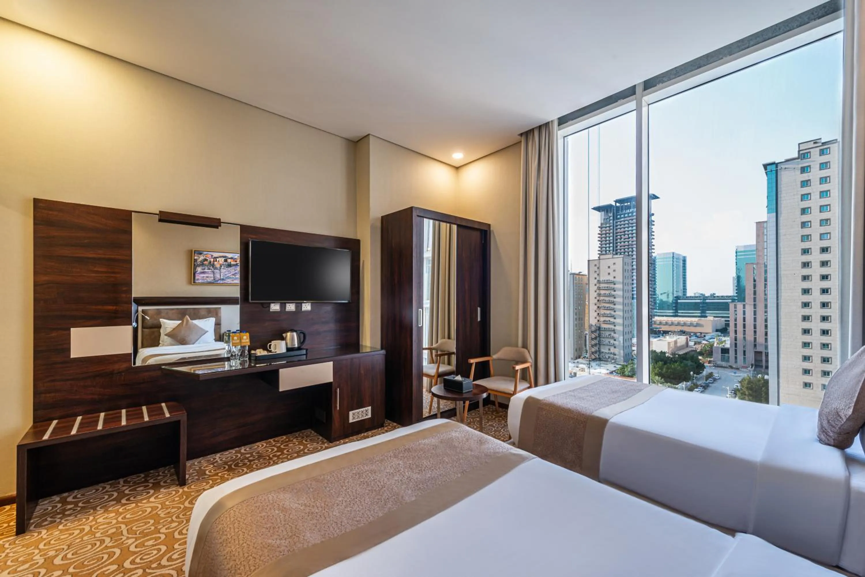 Bed in Crown Rose Al Sahafa Hotel