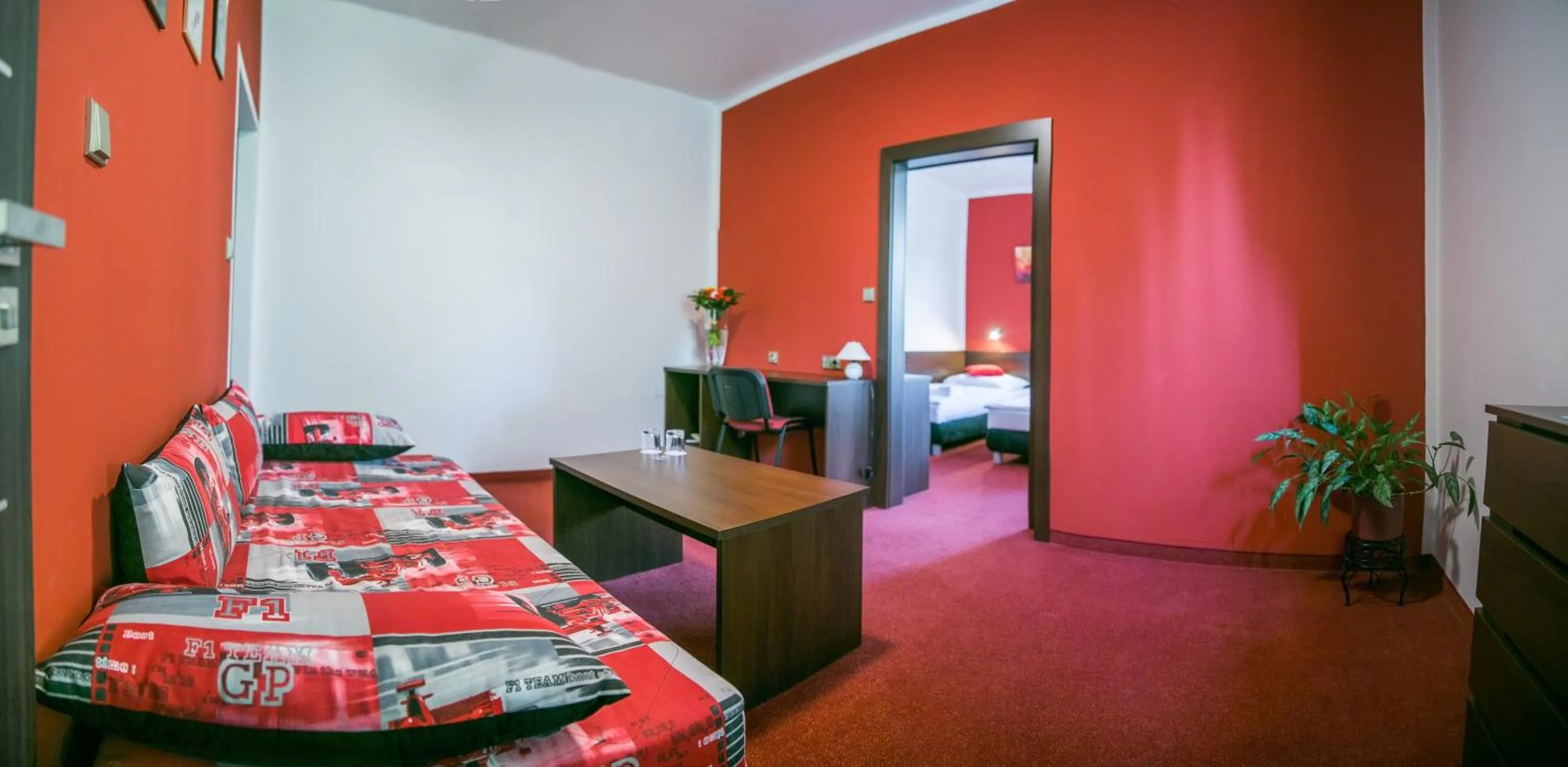 Living room, Bed in Hotel Best