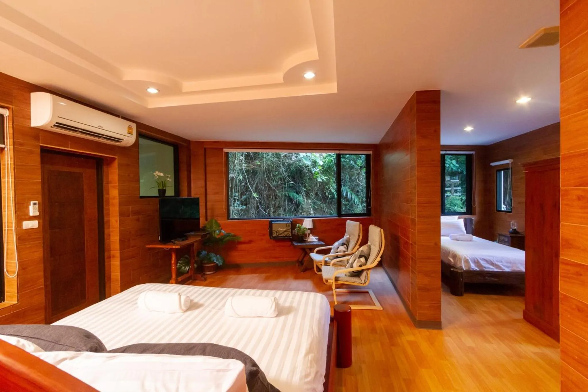 Bed in Namtok Sarika Resotel