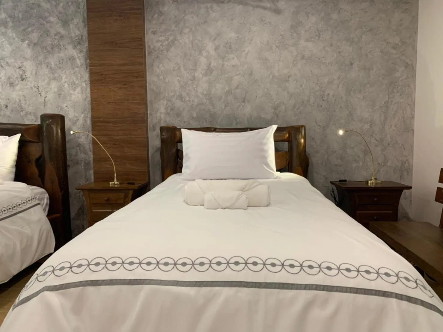 Bed in Namtok Sarika Resotel