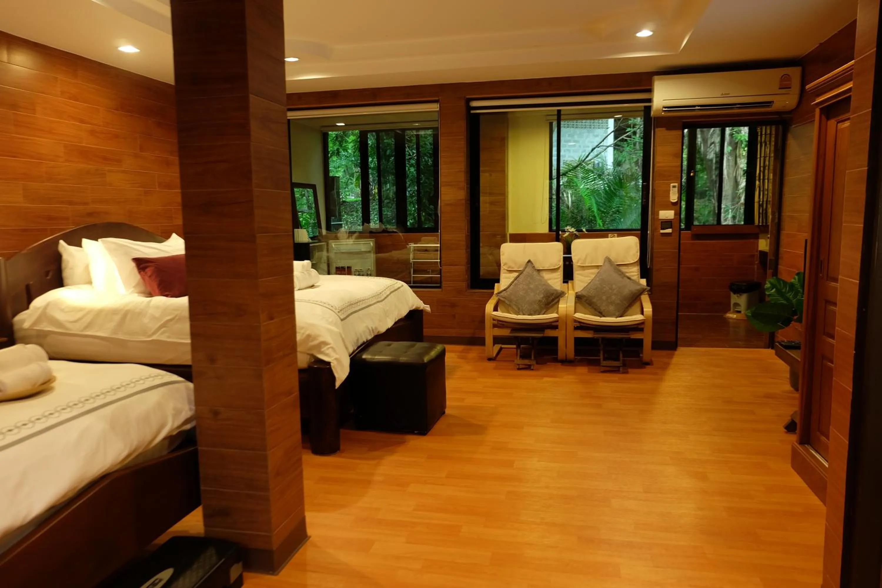 Bed in Namtok Sarika Resotel