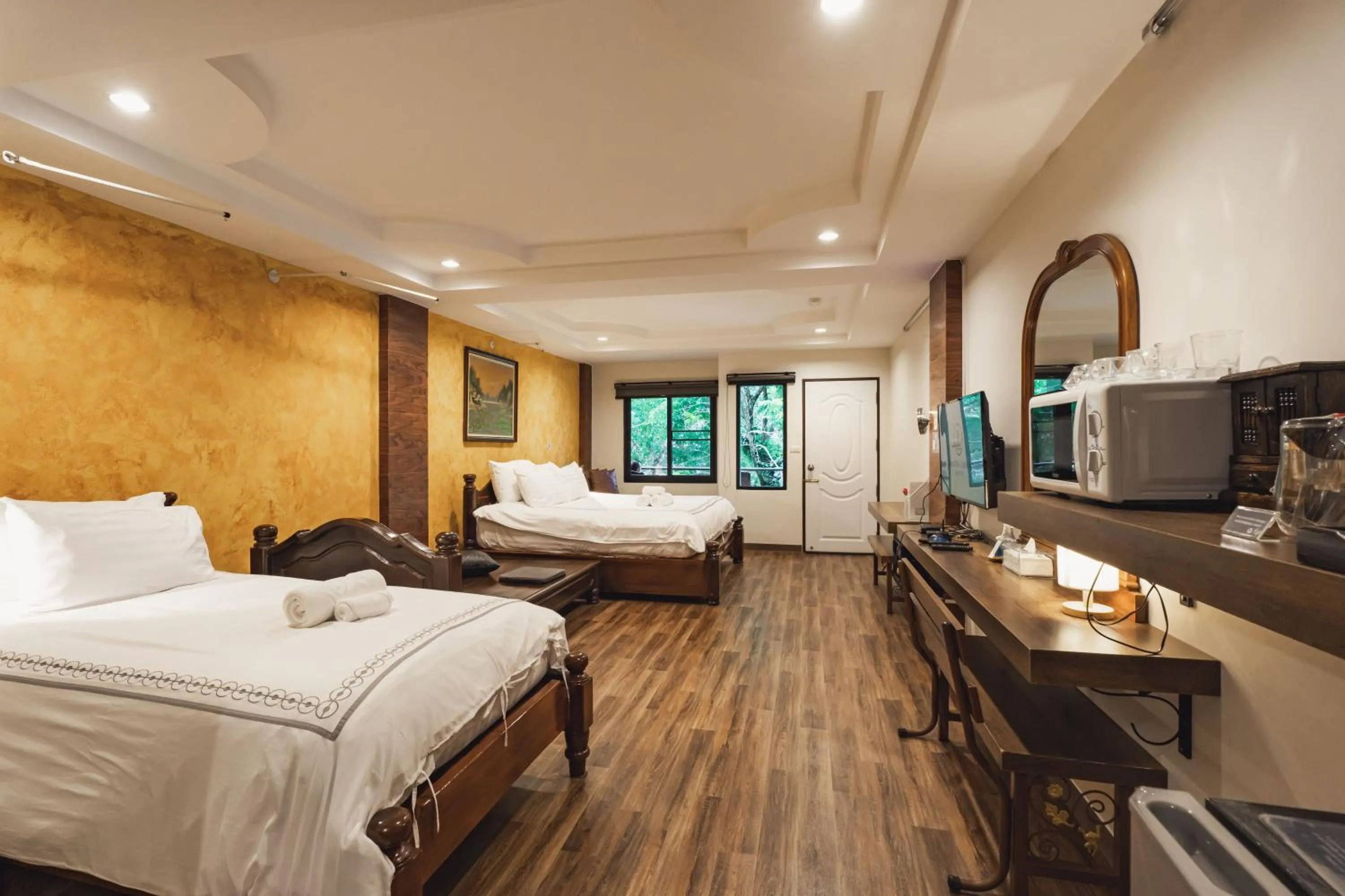 Bed in Namtok Sarika Resotel