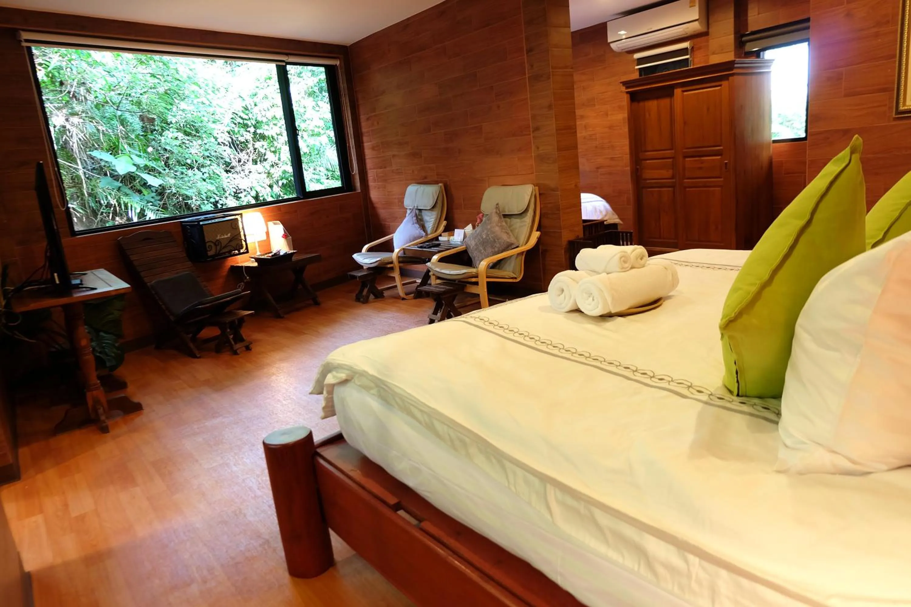 Bed in Namtok Sarika Resotel