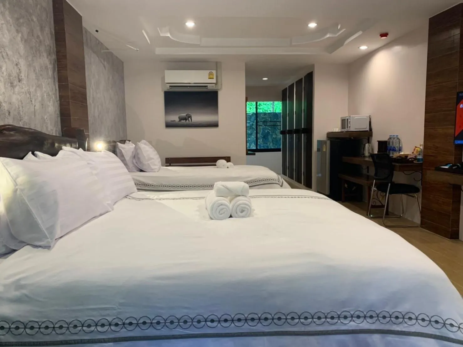 Bed in Namtok Sarika Resotel