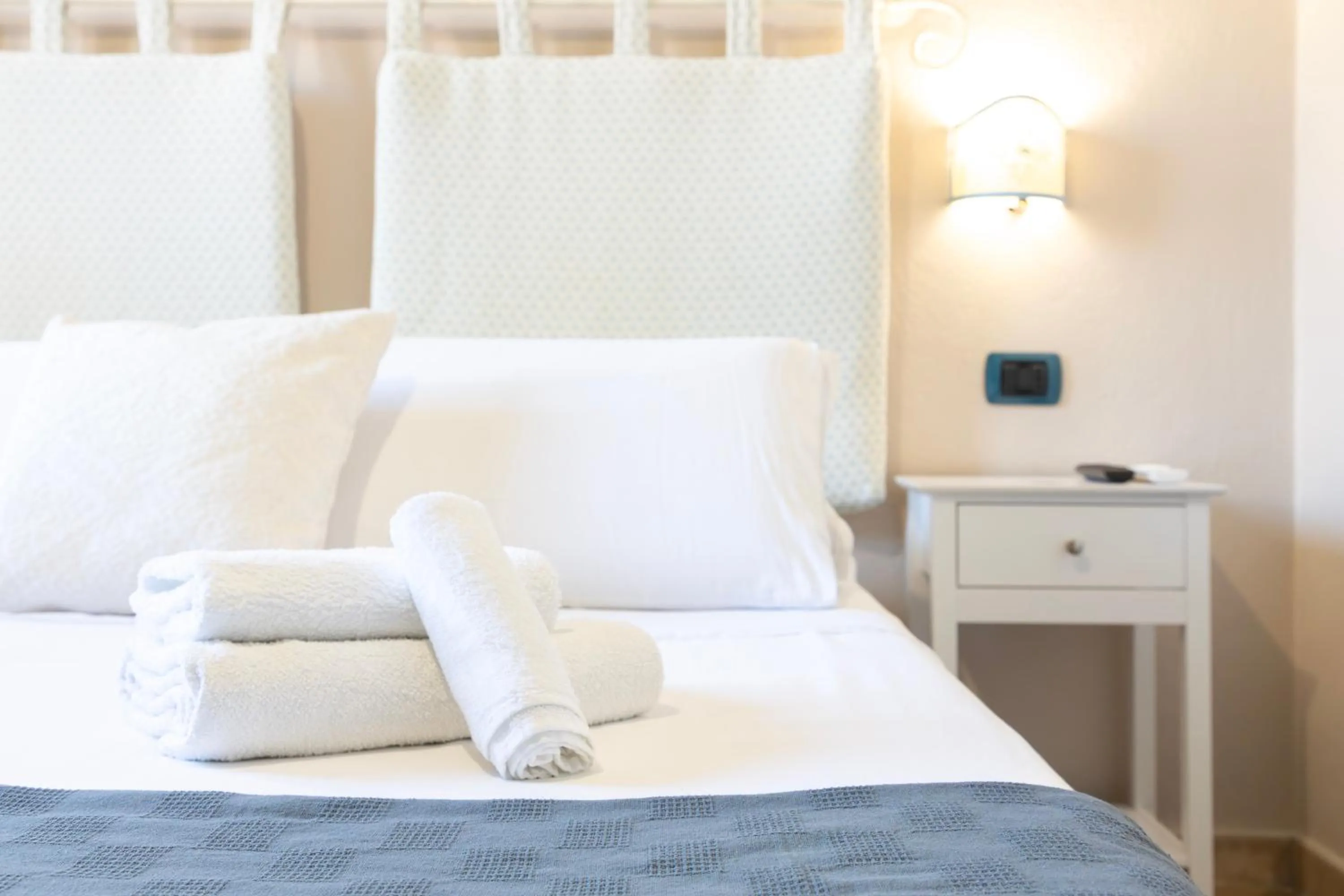 towels, Bed in Giaco's Rooms