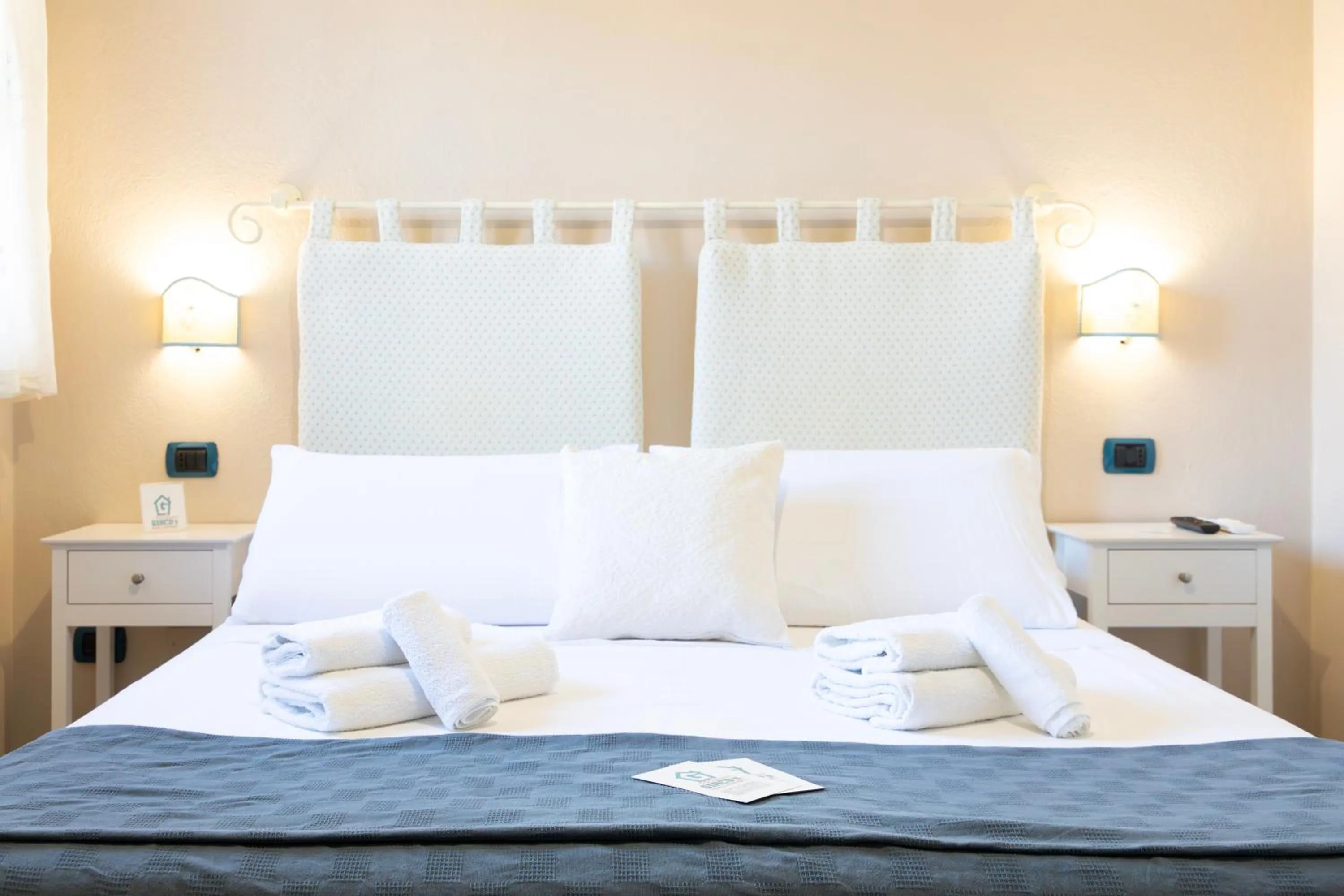 Bed in Giaco's Rooms