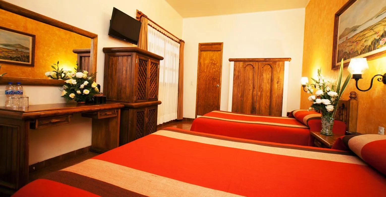Bed in Gran Hotel Pátzcuaro