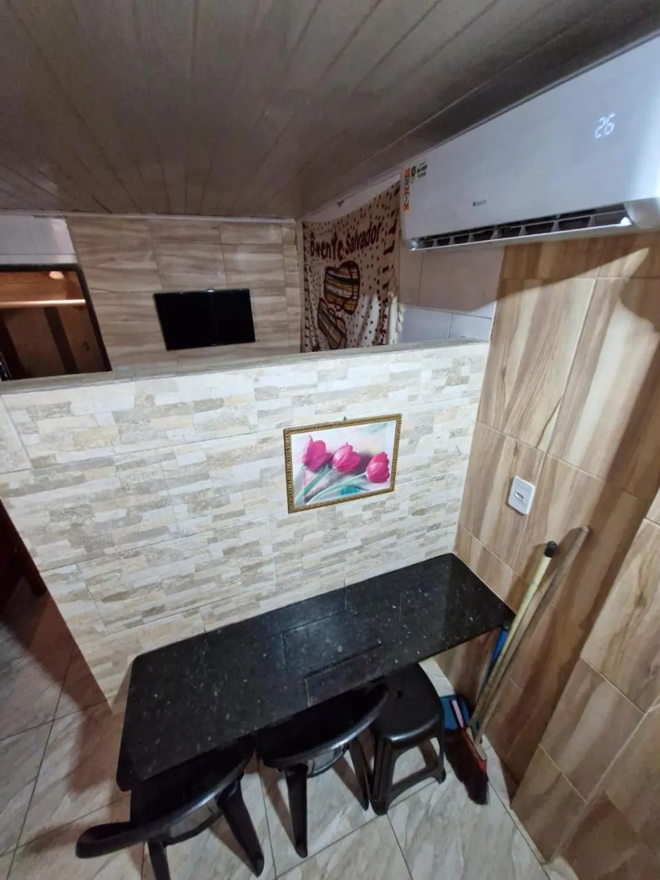 Kitchen or kitchenette in Kitnets com AR Condicionado na Praia