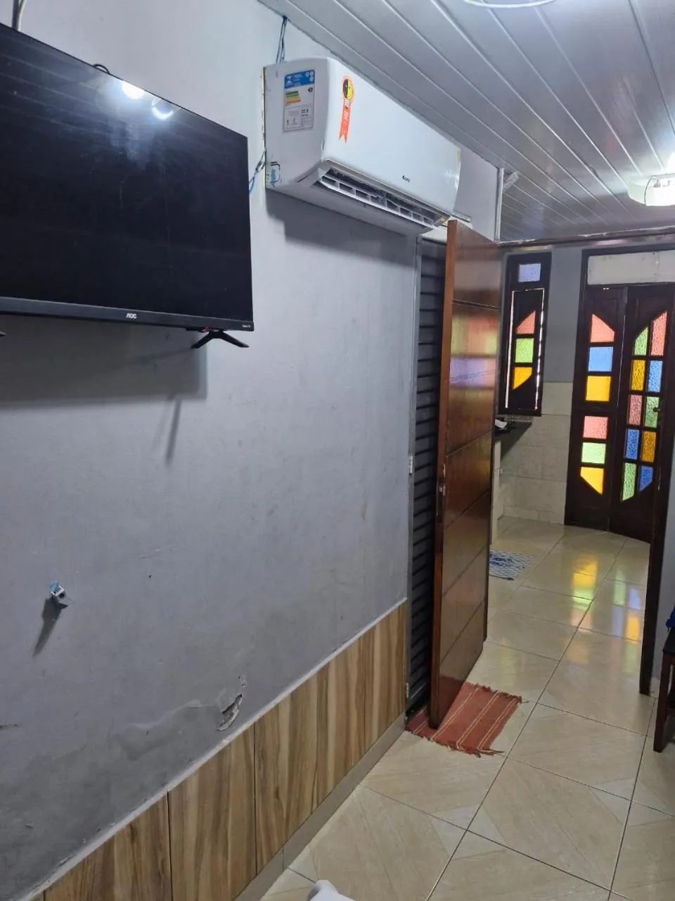 Communal lounge/ TV room in Kitnets com AR Condicionado na Praia