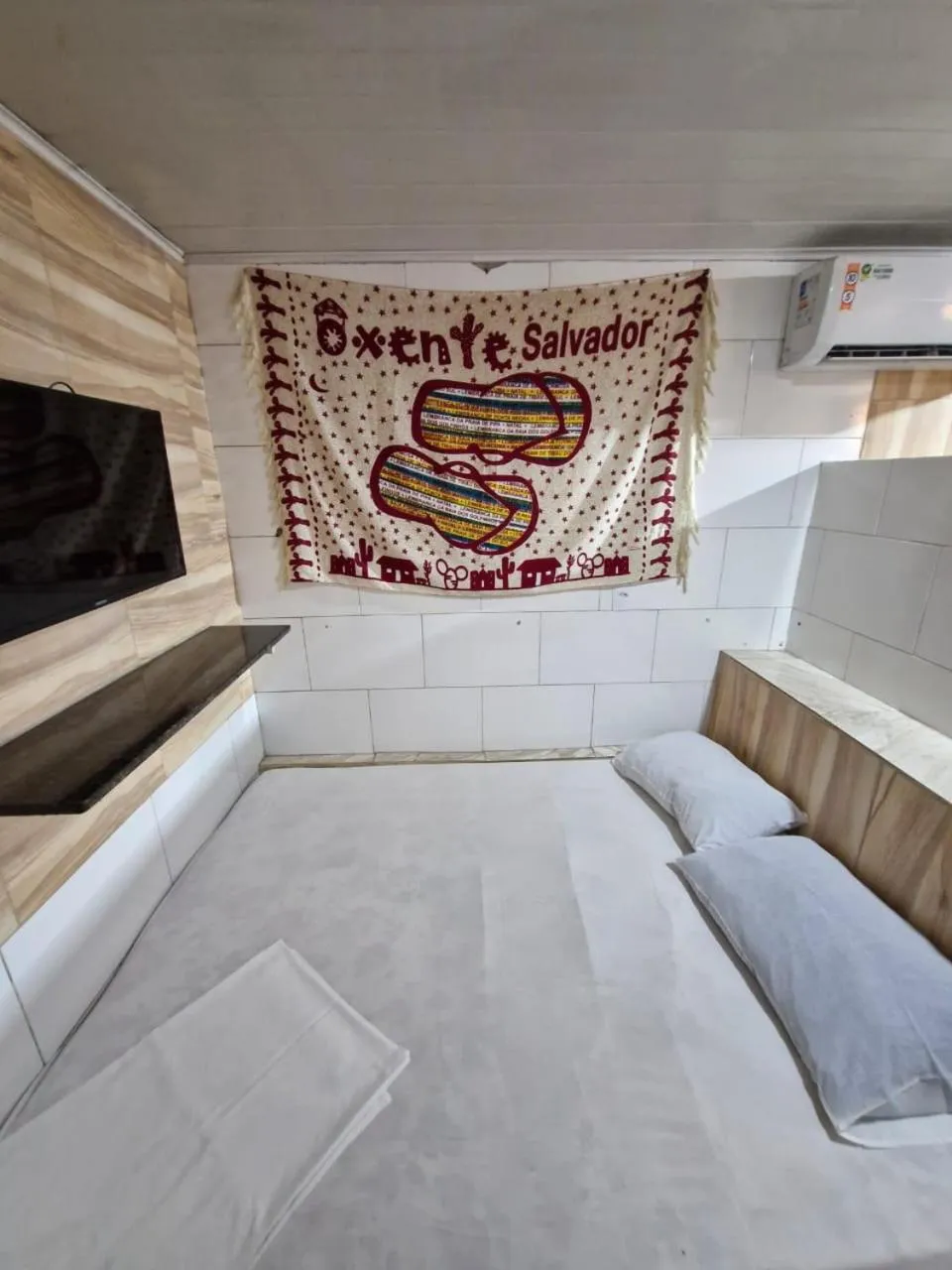 Bed in Kitnets com AR Condicionado na Praia