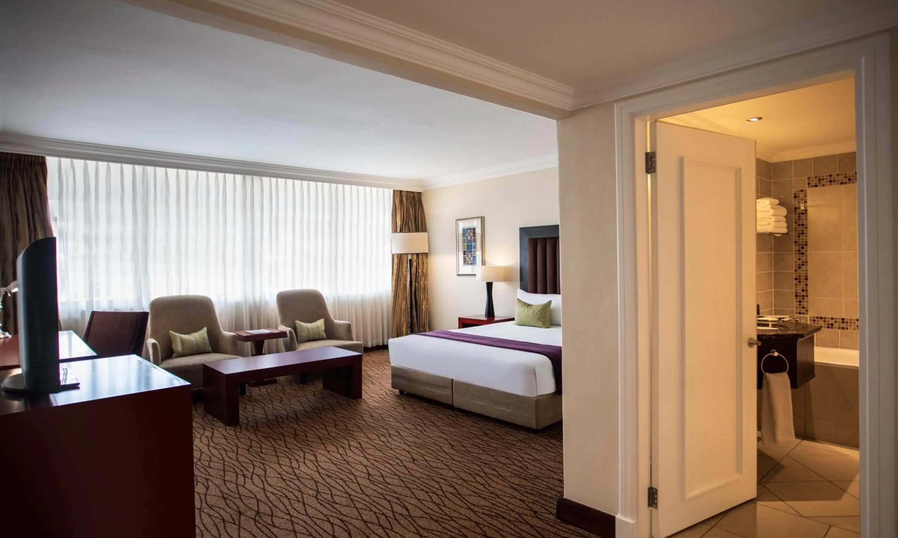 Photo of the whole room, Bed in Avani Windhoek Hotel & Casino