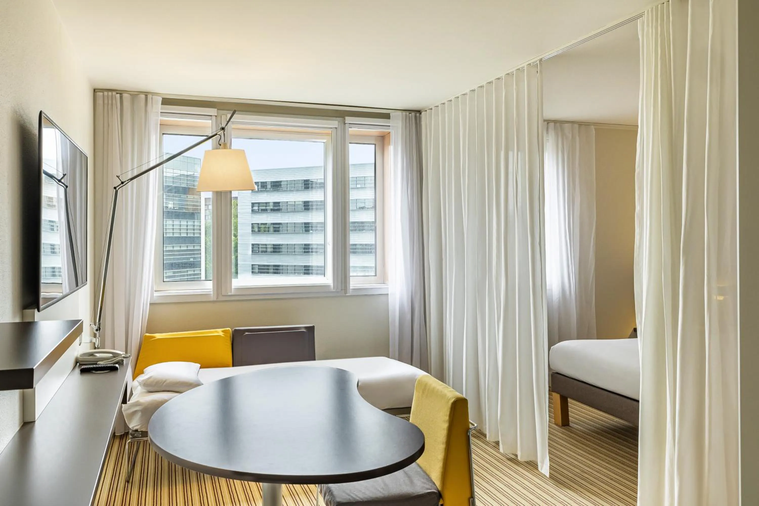 Bedroom in Novotel Suites Lille Europe