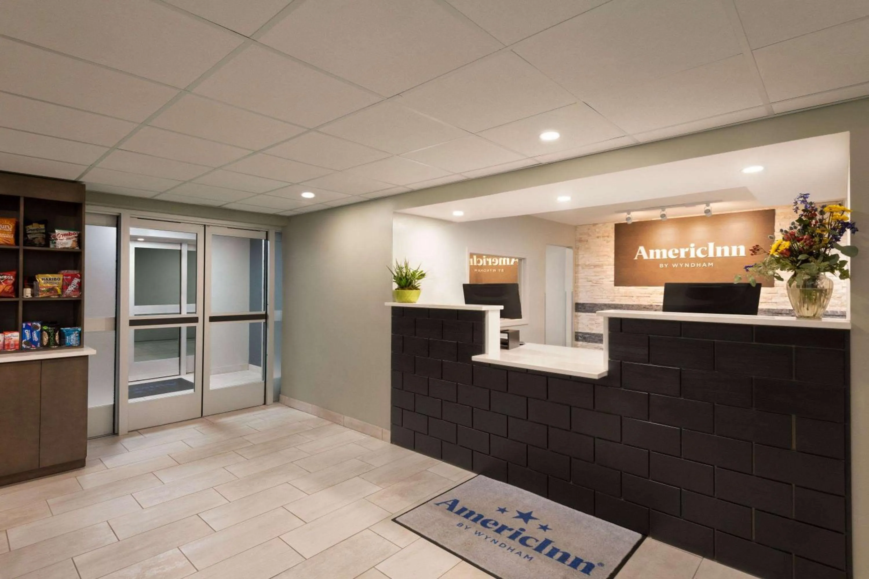 Lobby or reception in AmericInn by Wyndham Dodgeville