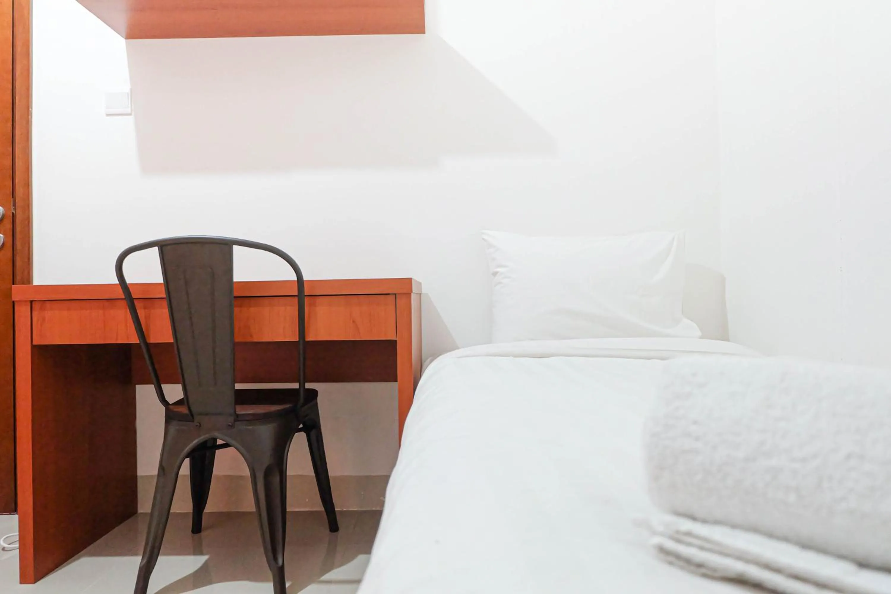 Bedroom in Fabulous 2BR Signature Park Grande Apartment By Travelio