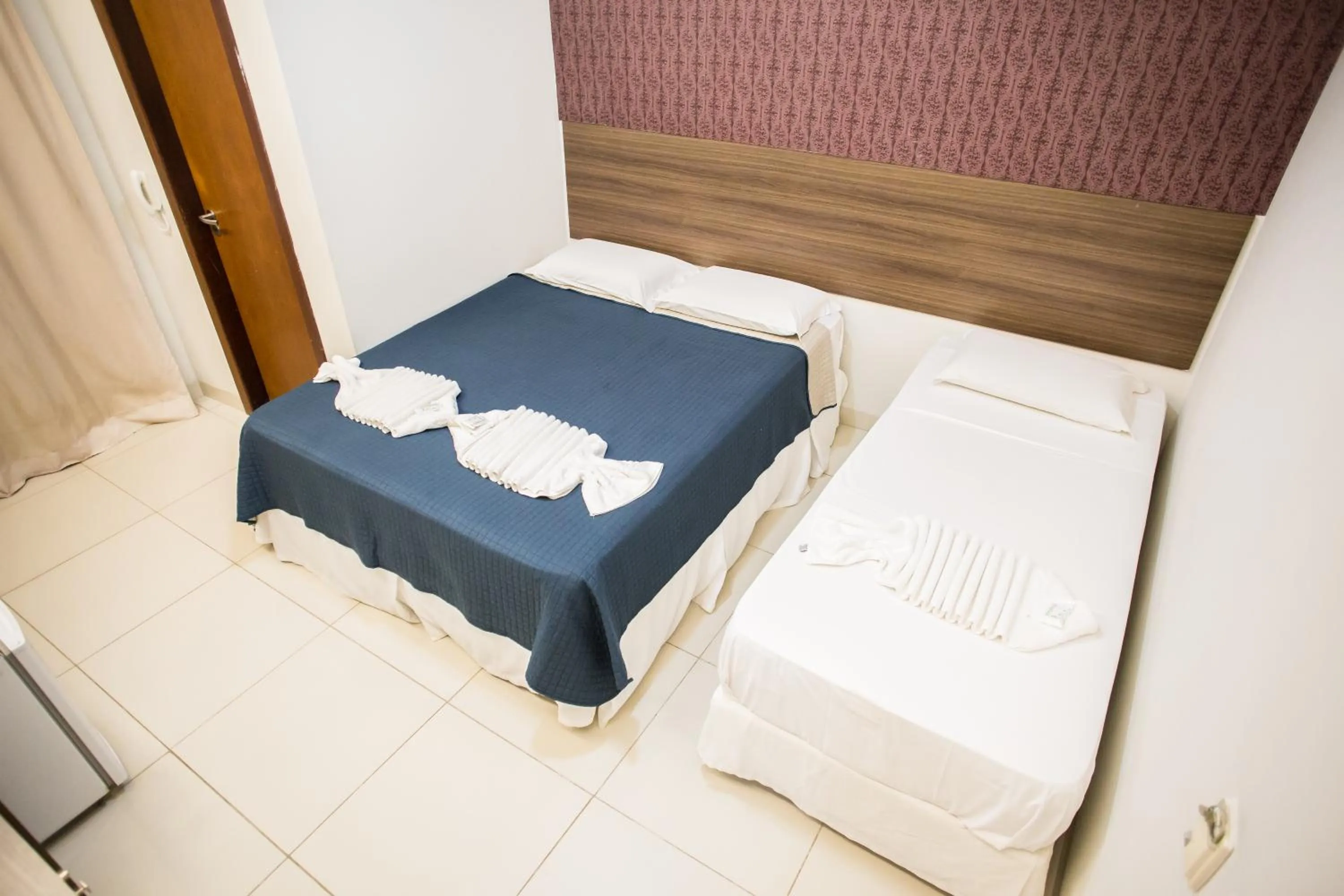 Bed in Pousada Orla dos Corais