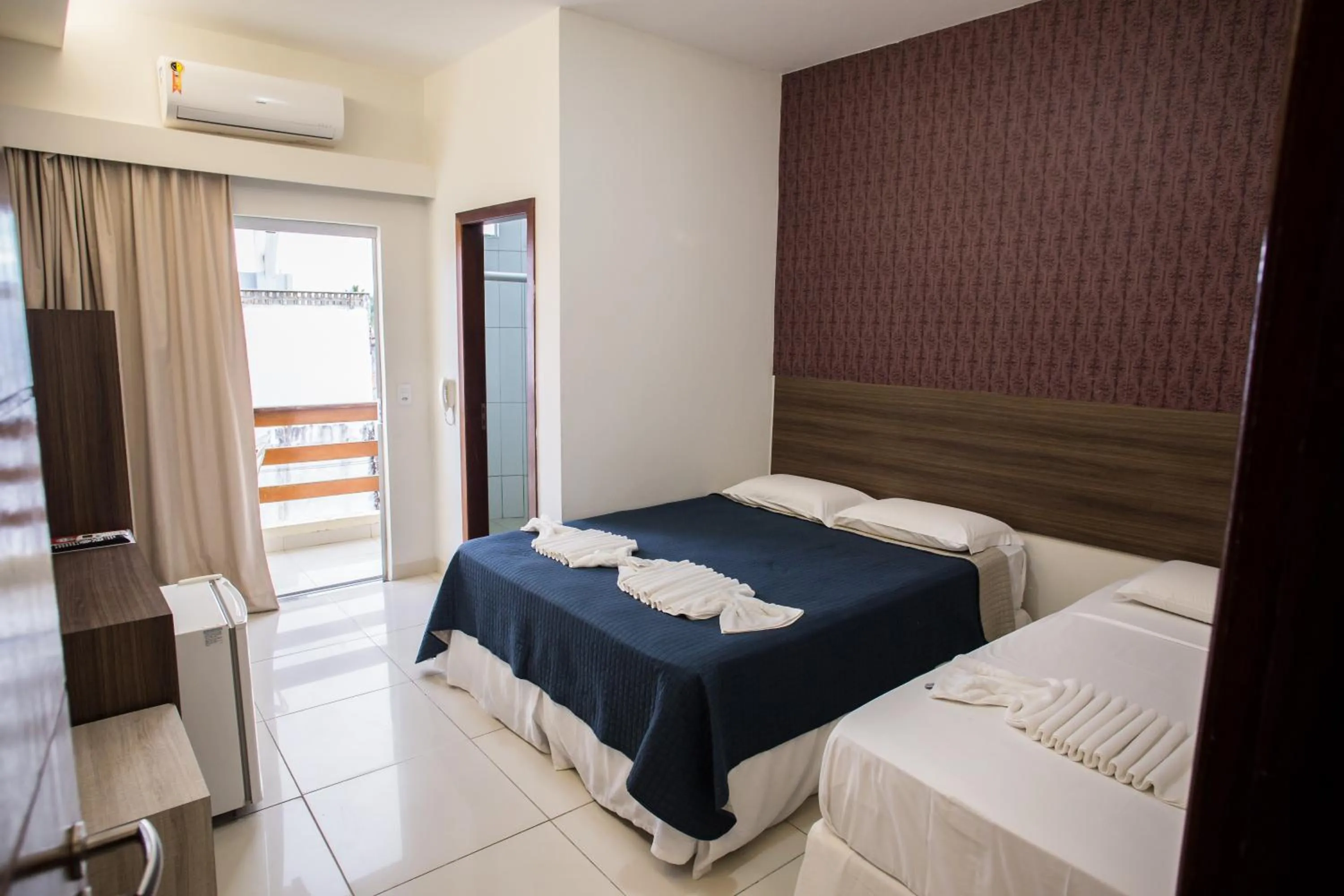 Bed in Pousada Orla dos Corais