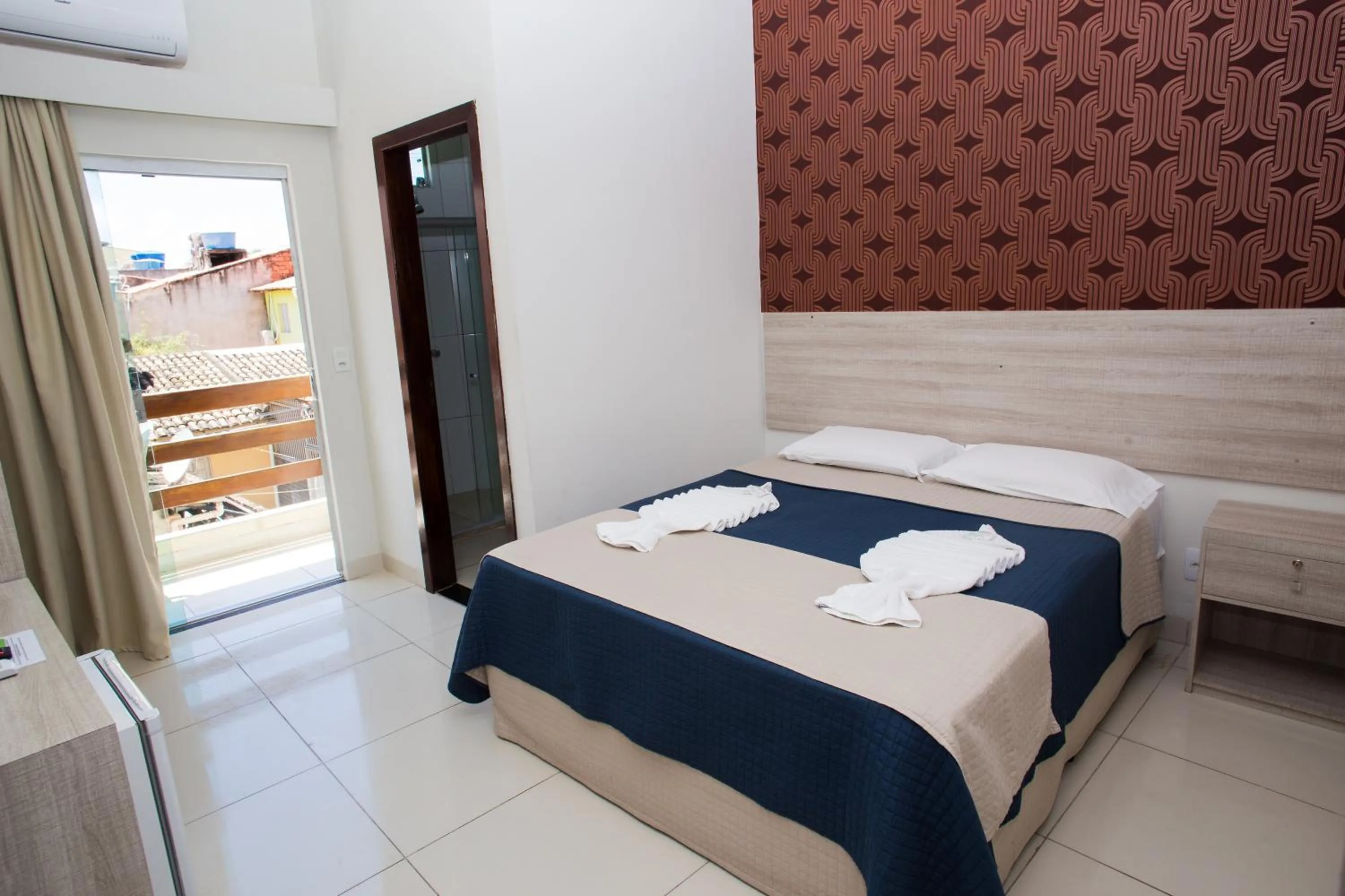 Bed in Pousada Orla dos Corais