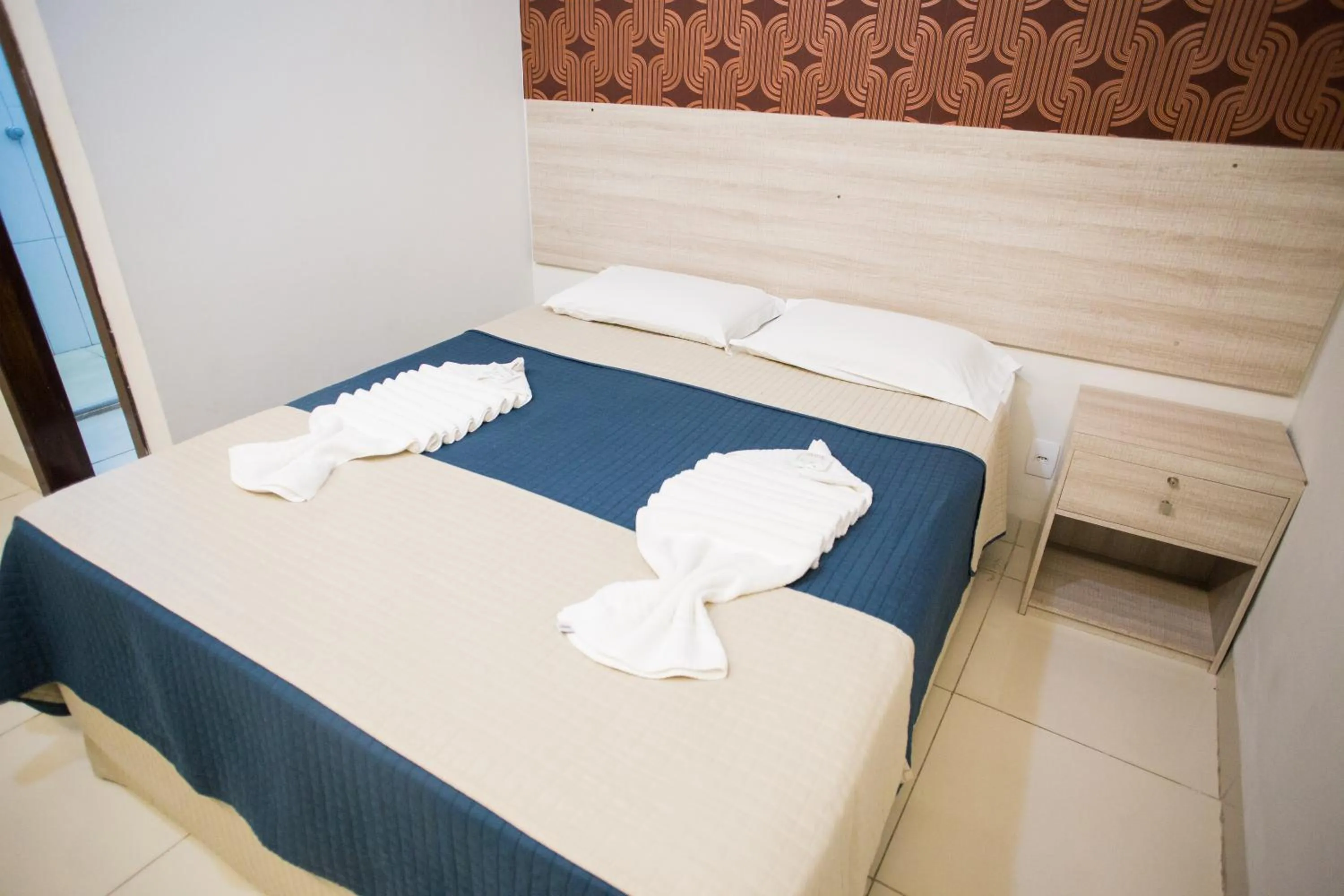 Bed in Pousada Orla dos Corais