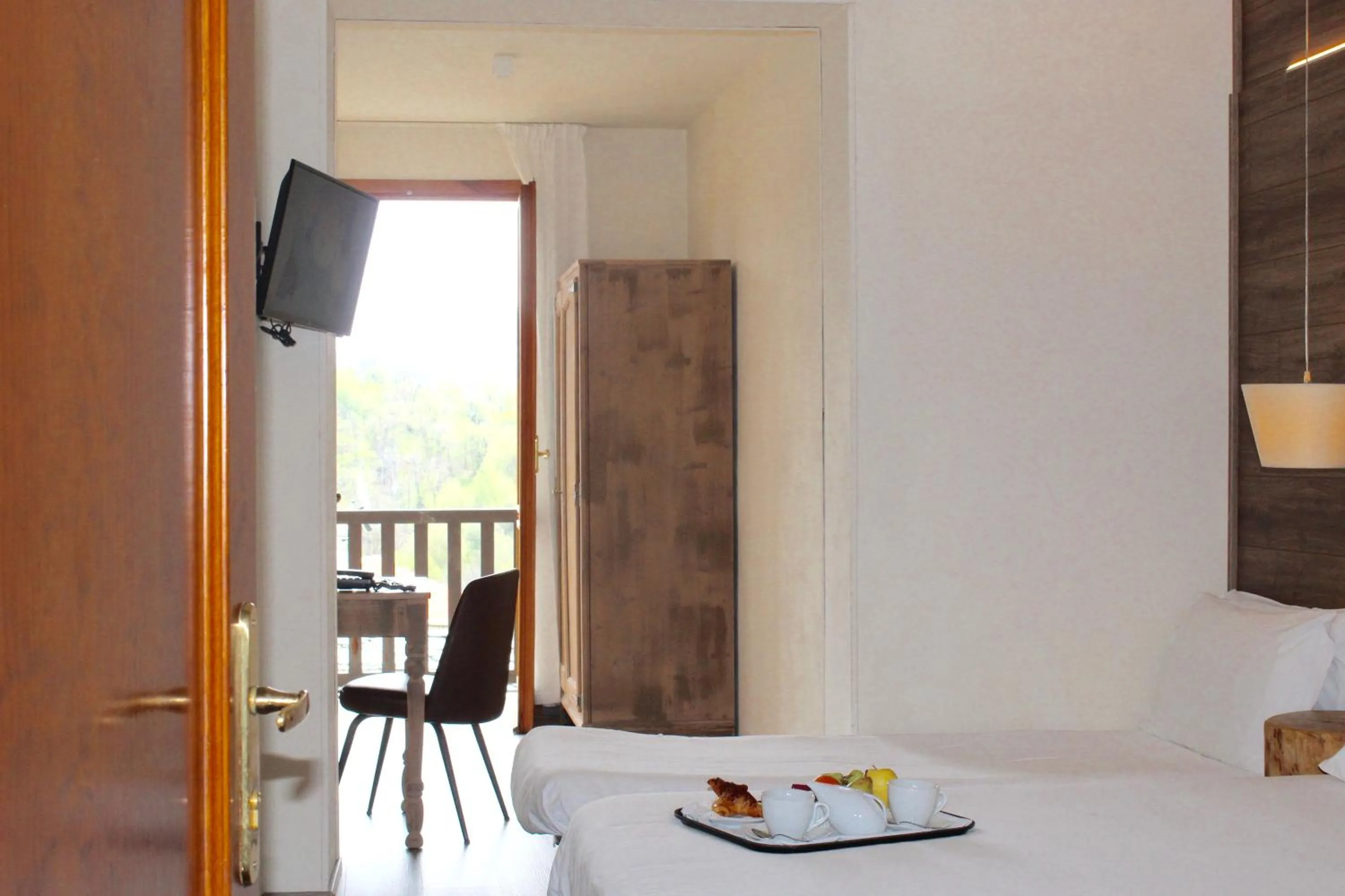 Bedroom in Hotel Miramonti Family & SPA