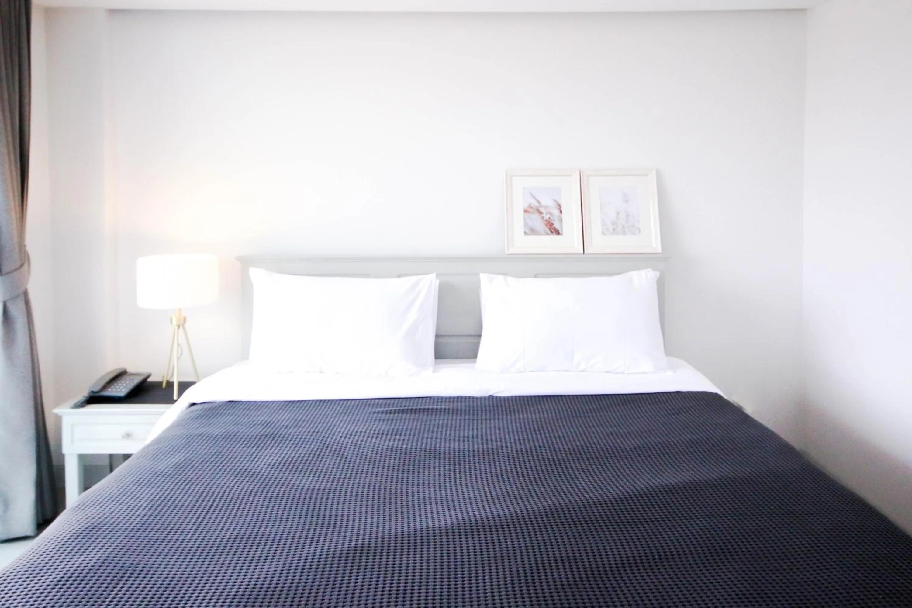 Bed in Tonkla Boutique Hotel