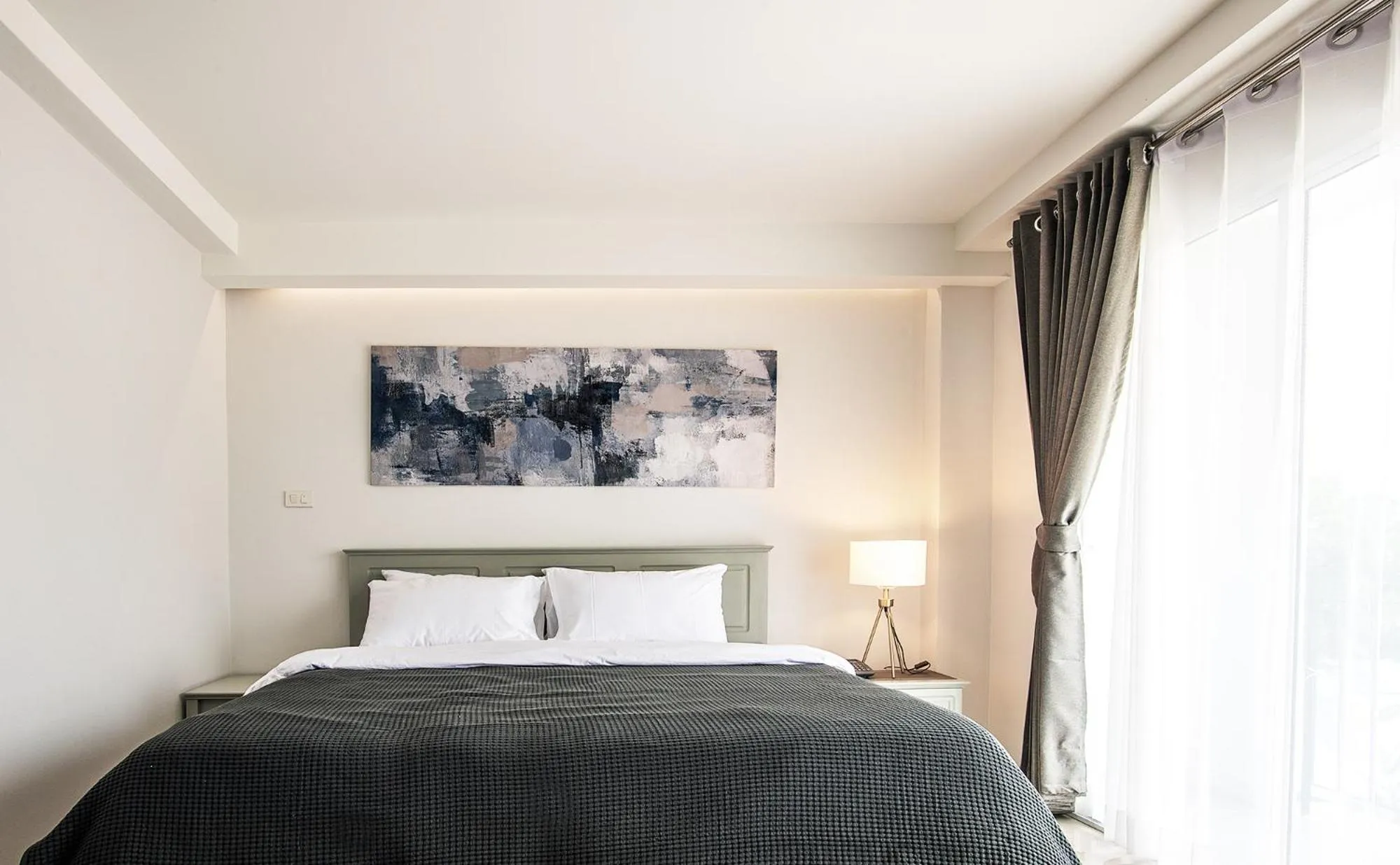 Bed in Tonkla Boutique Hotel