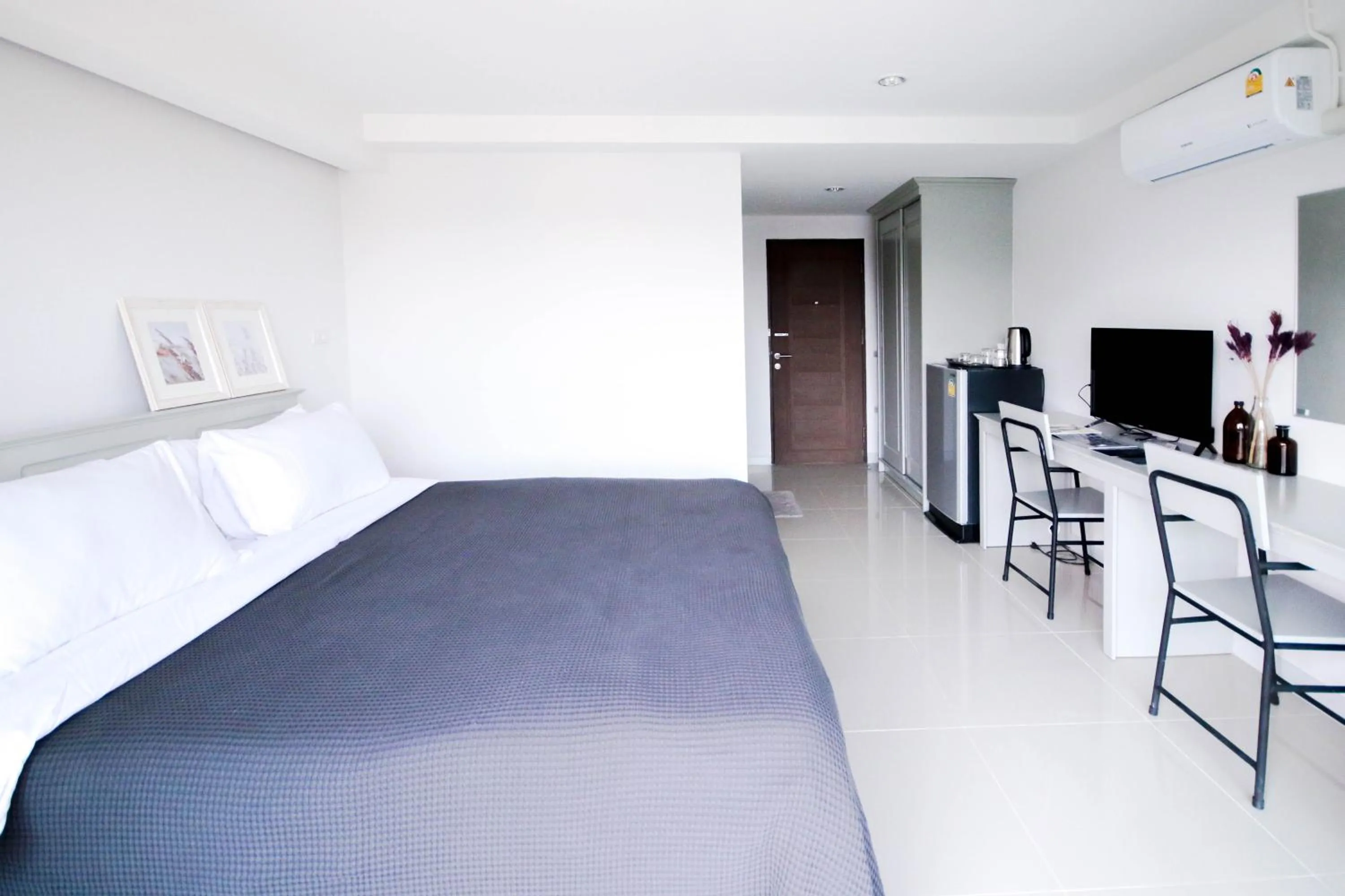 Bed in Tonkla Boutique Hotel