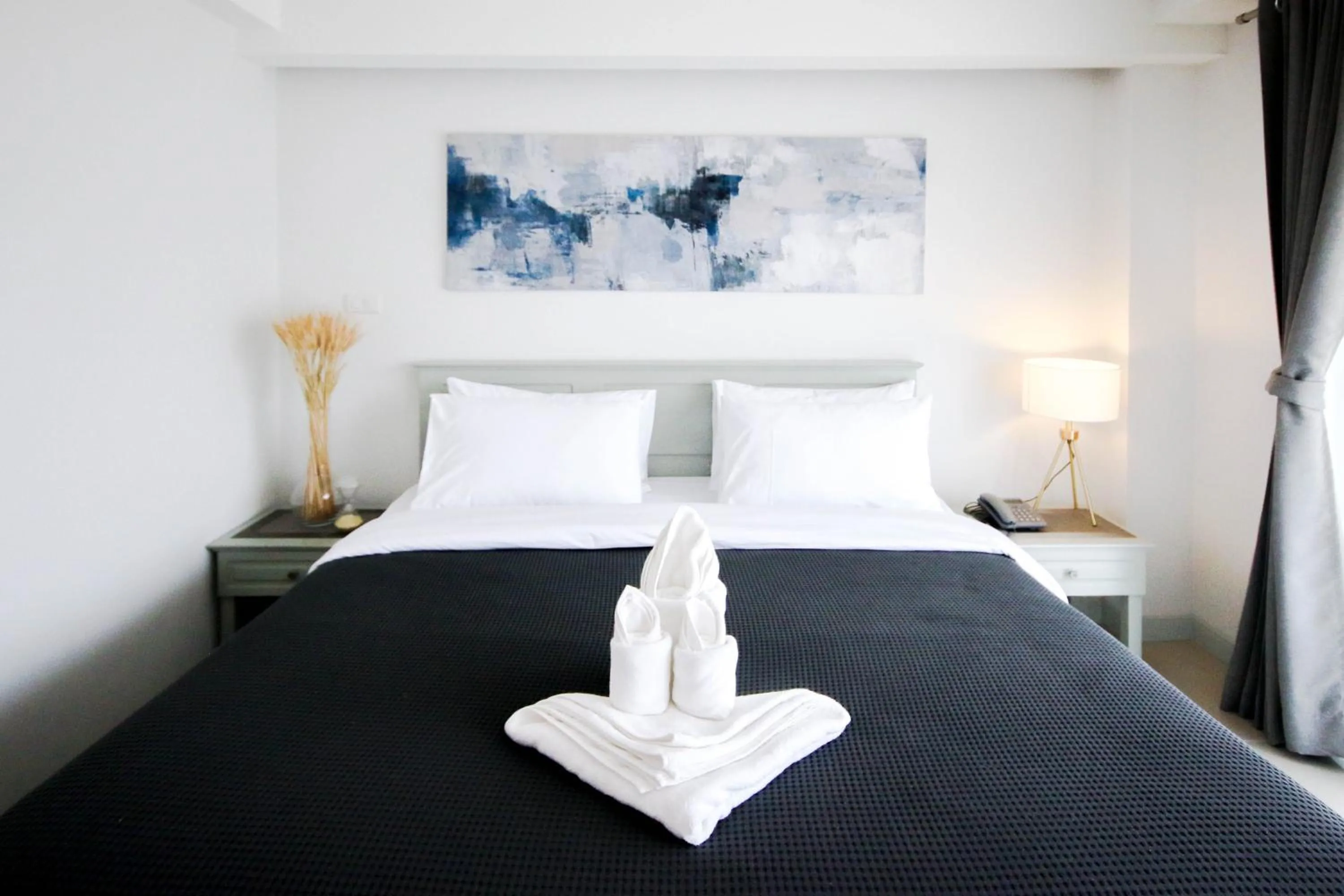 Bed in Tonkla Boutique Hotel