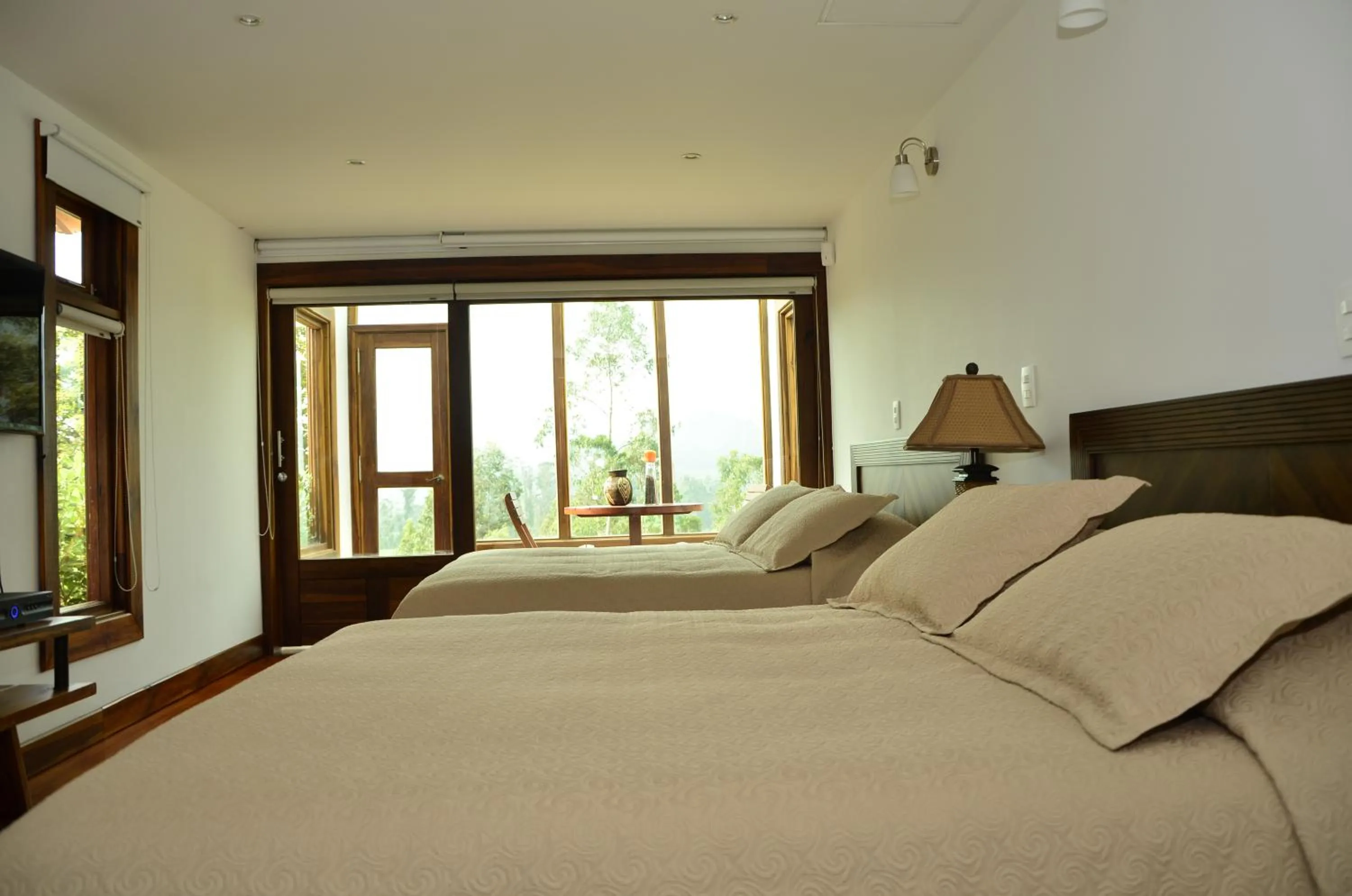 Photo of the whole room, Bed in Termales El Otoño