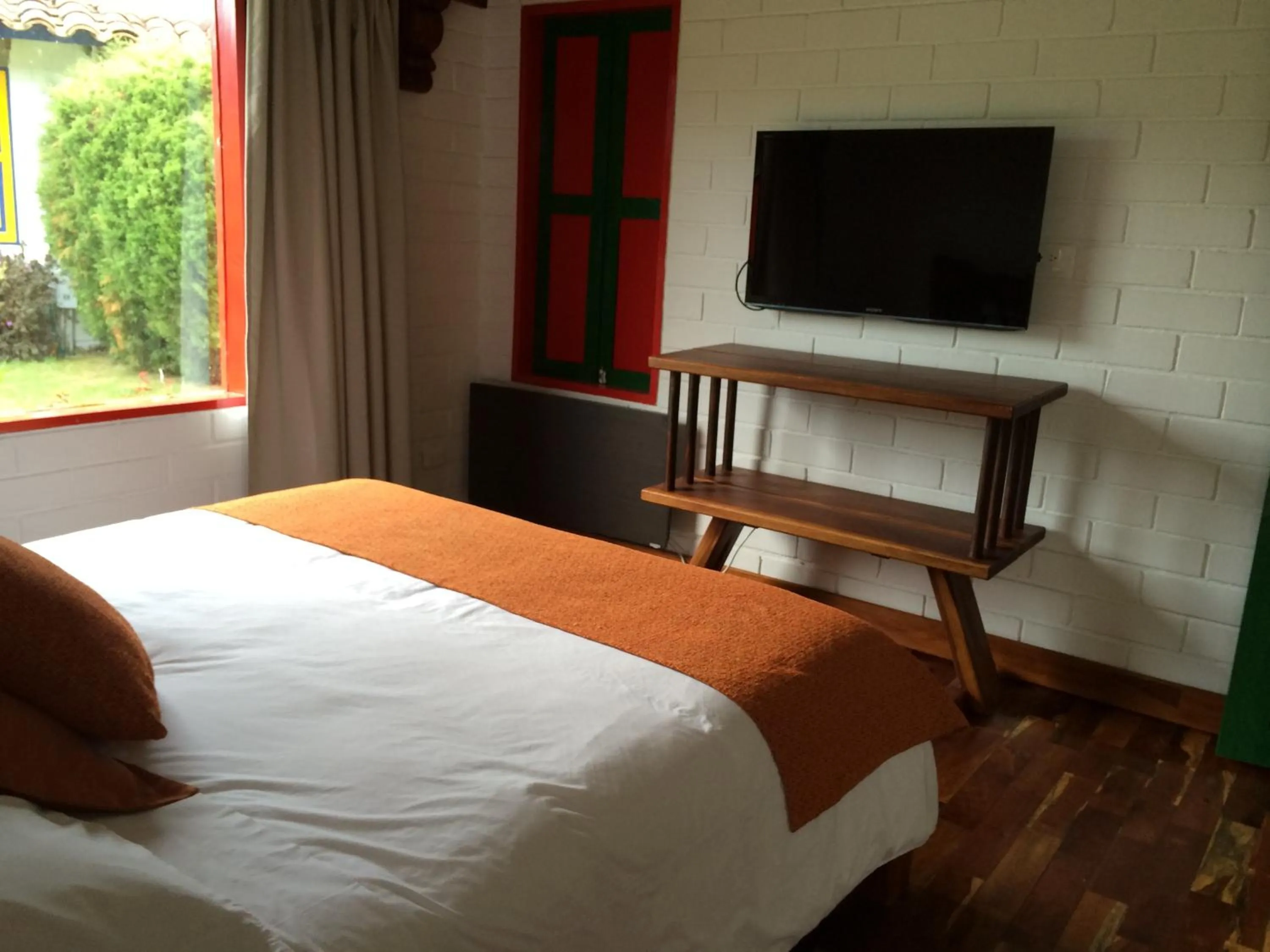 Photo of the whole room, Bed in Termales El Otoño