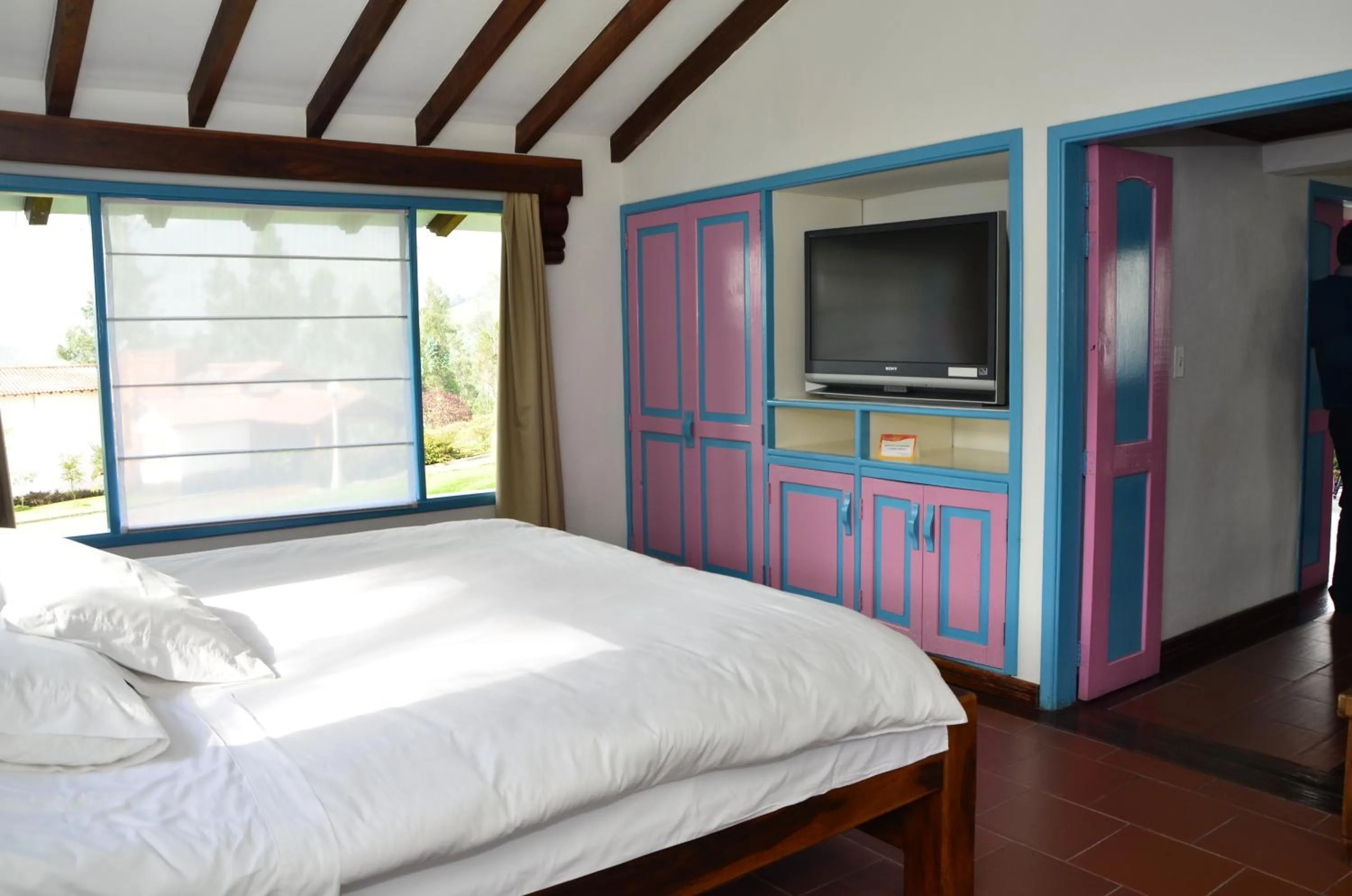 Photo of the whole room, Bed in Termales El Otoño