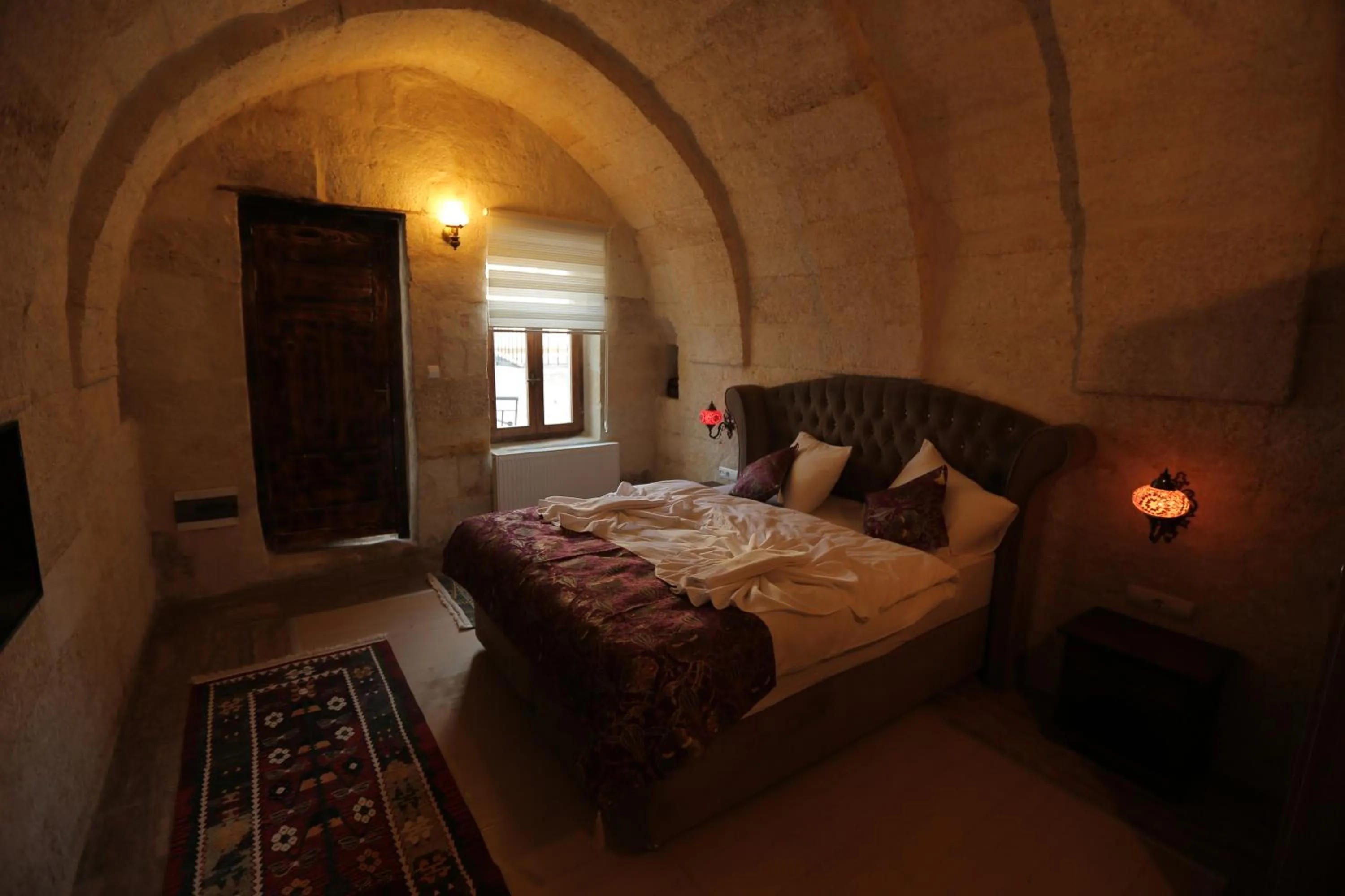Bed in Sandık cave suites