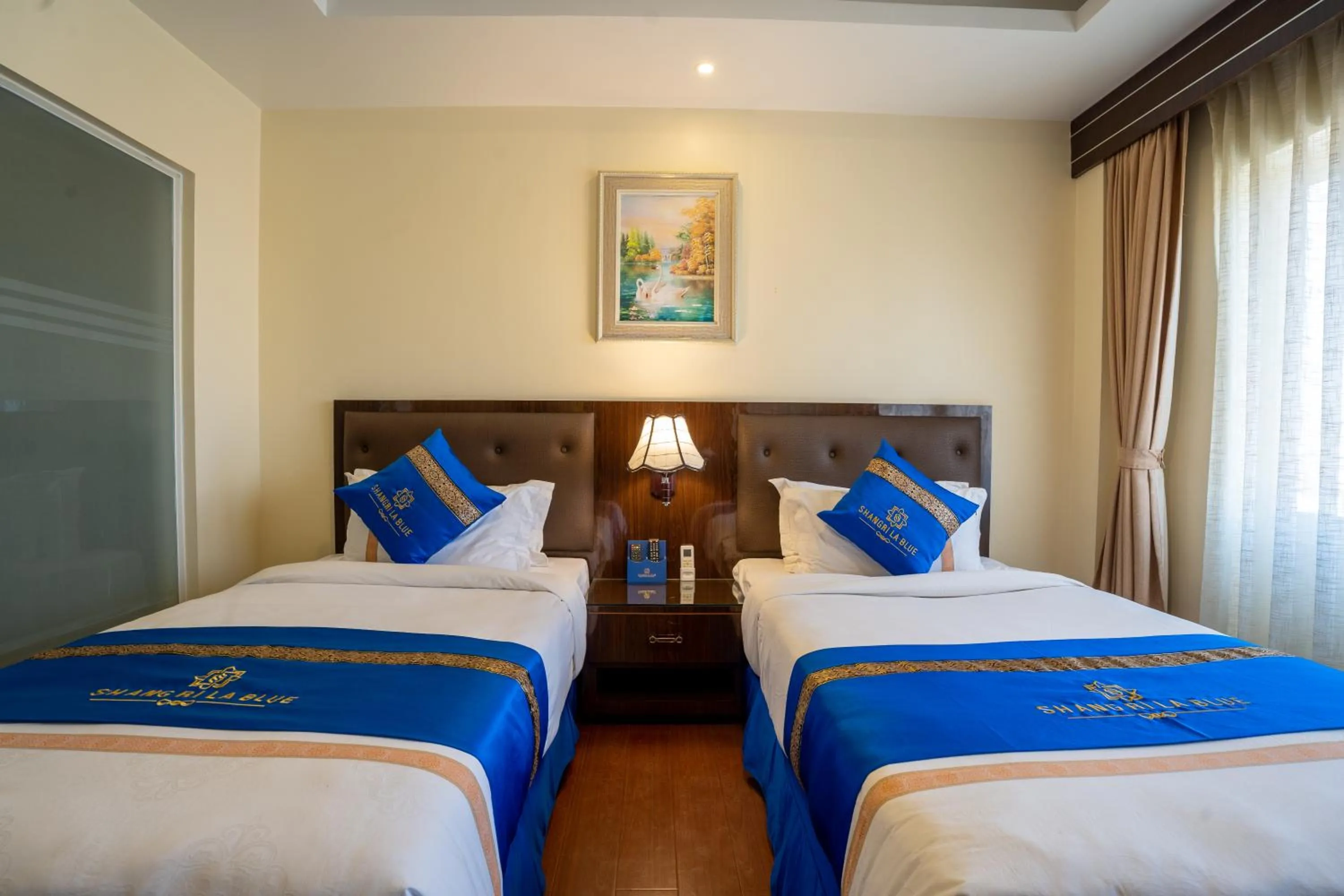 Bedroom in Shangrila Blu Hotel
