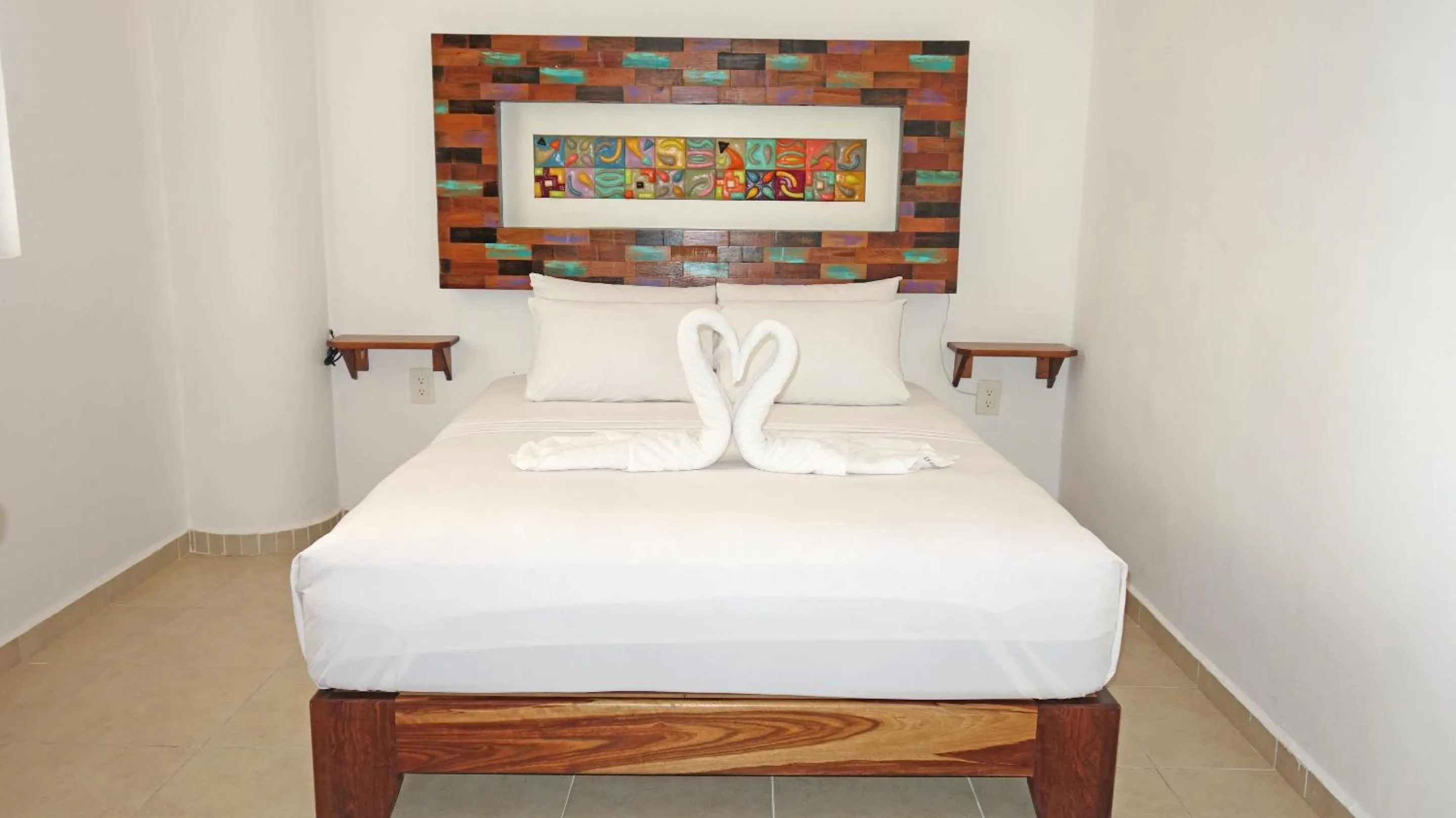 Bed in El Fuerte Beach Apartments