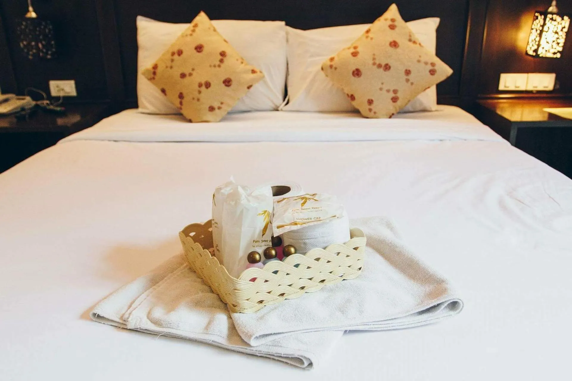 Bed in Palm Sweet Resort