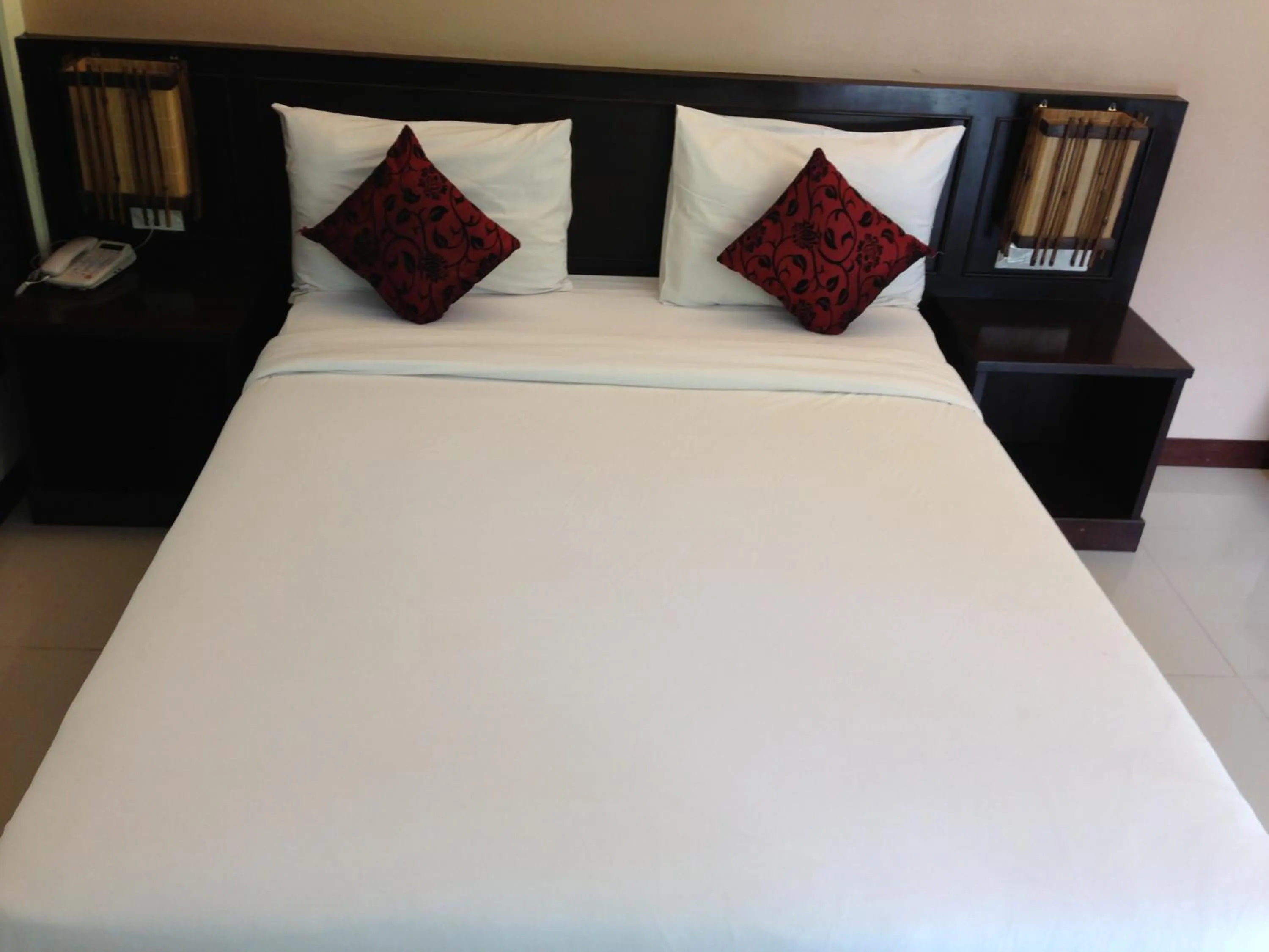 Bed in Palm Sweet Resort