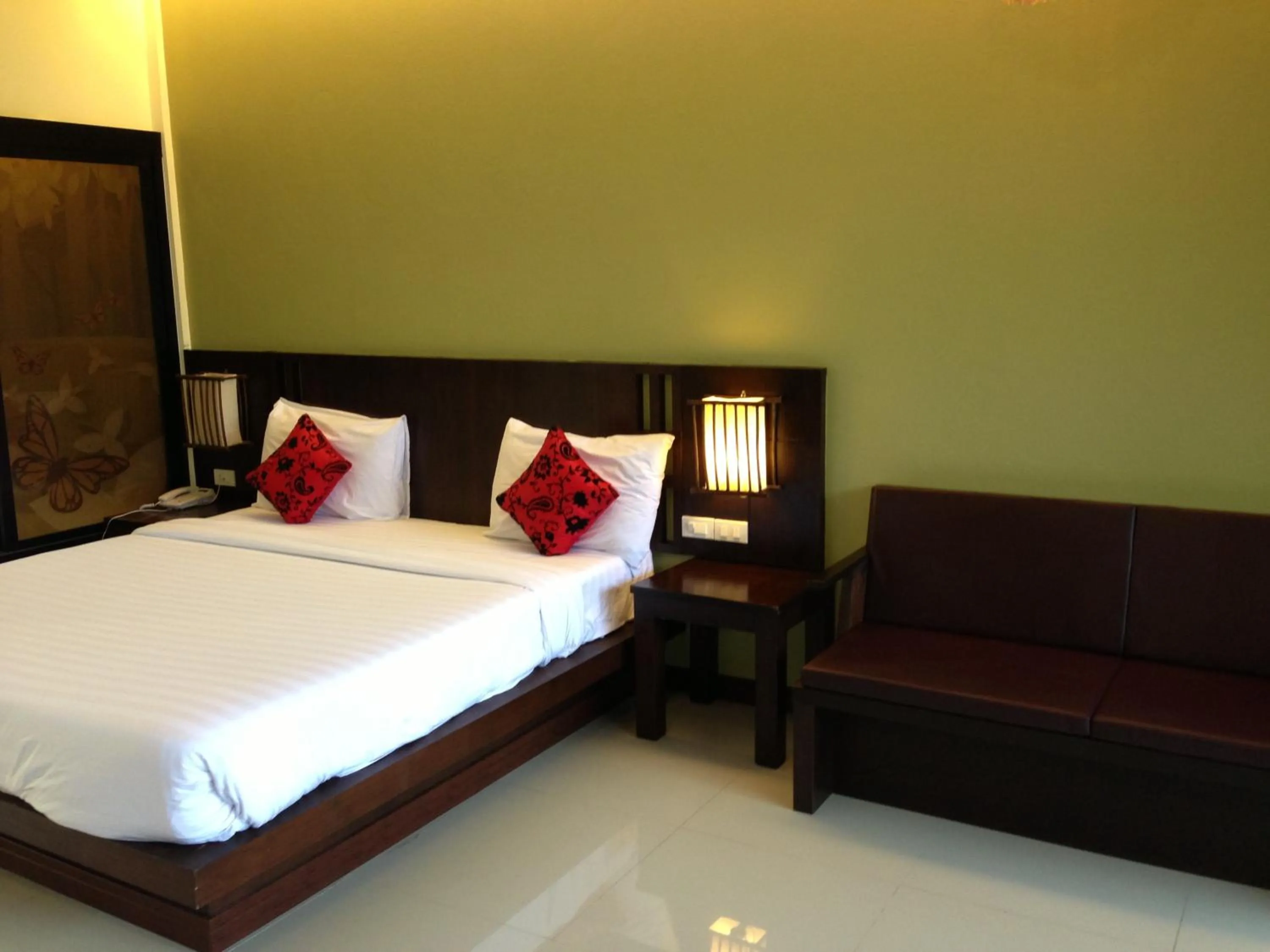 Bed in Palm Sweet Resort