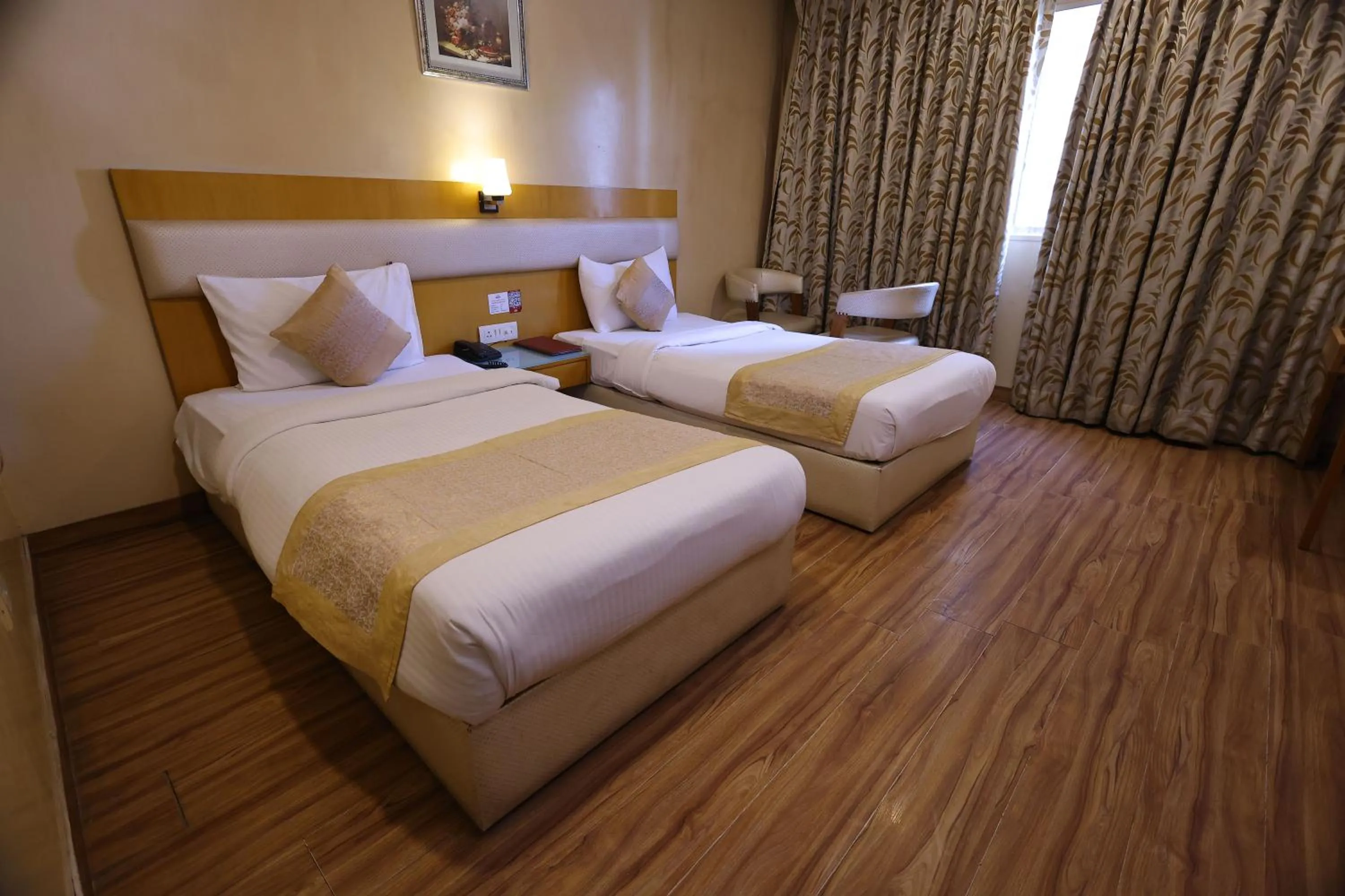 Bed in Airport Hotel Ramhan Palace Mahipalpur