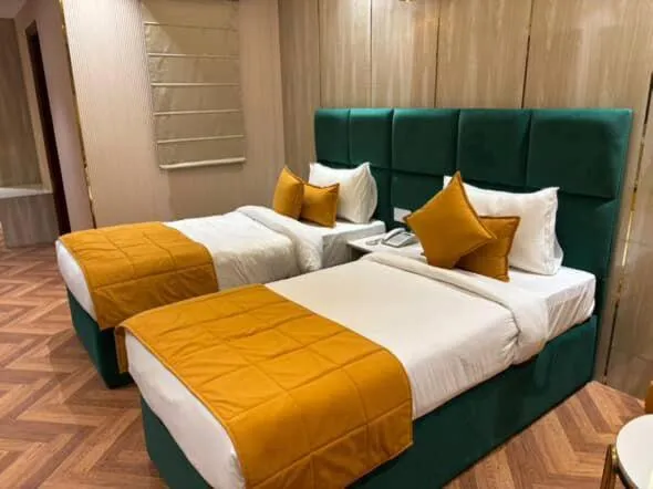 Bed in Airport Hotel Ramhan Palace Mahipalpur