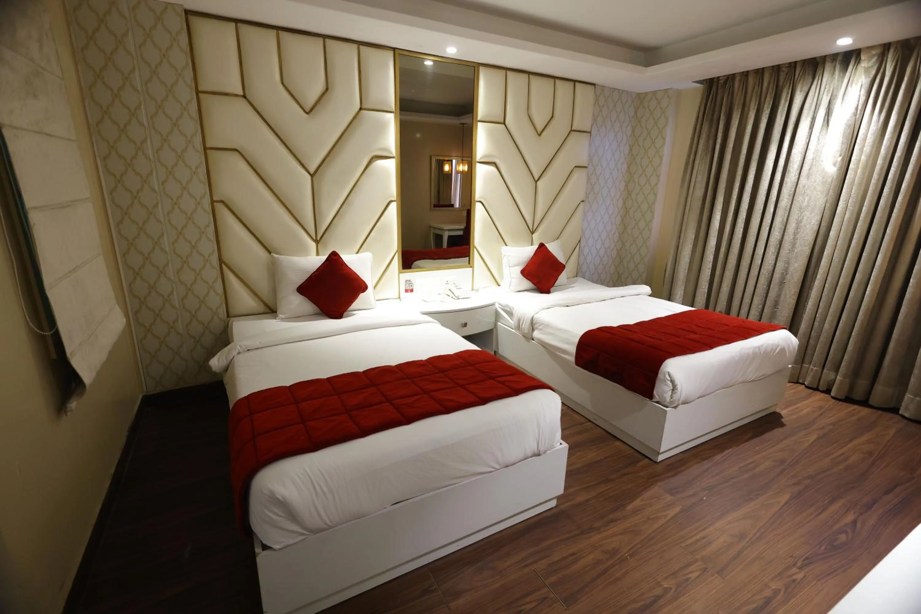 Bed in Airport Hotel Ramhan Palace Mahipalpur
