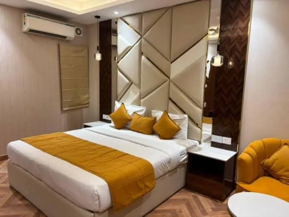 Bed in Airport Hotel Ramhan Palace Mahipalpur