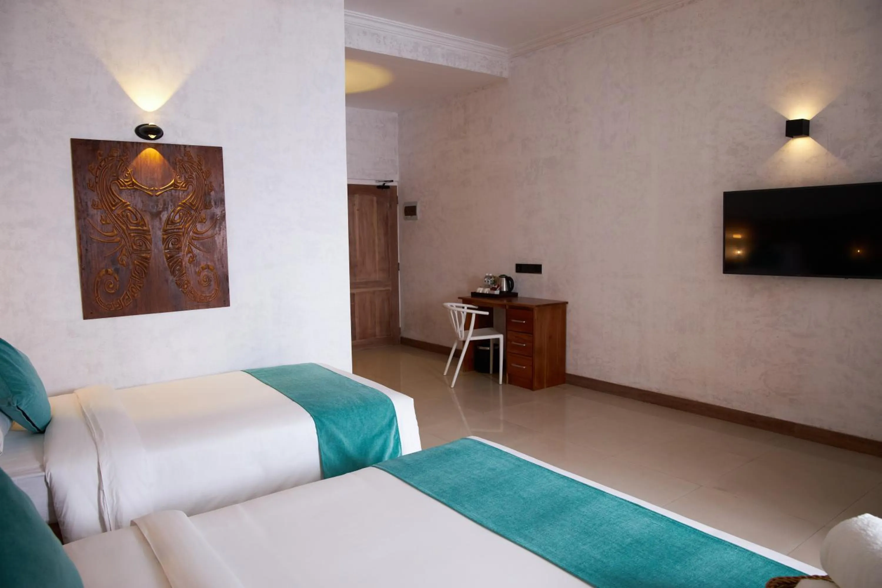 Bed in Seahorse Hotel & Spa