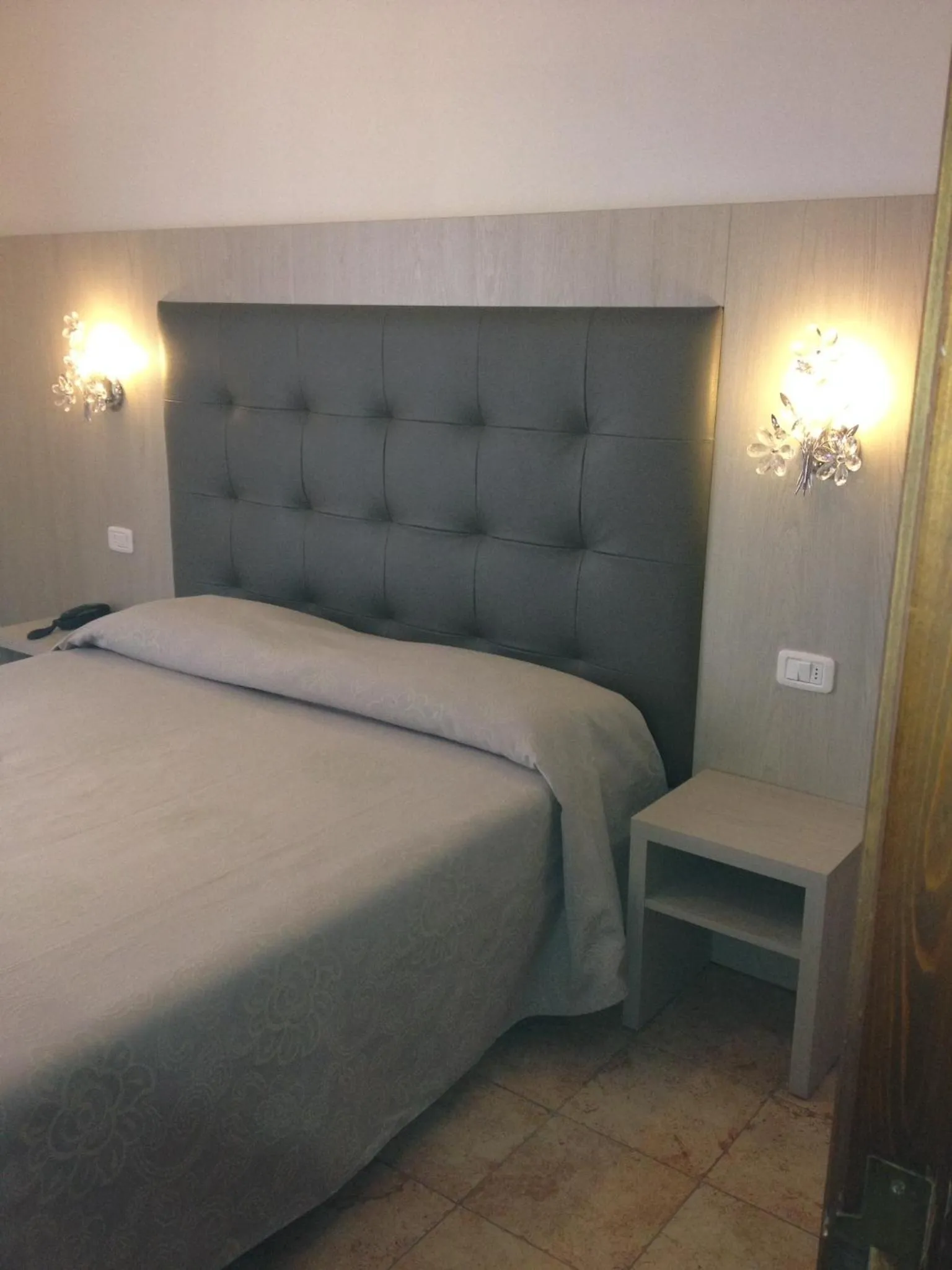 Decorative detail, Bed in Hotel Lucerna