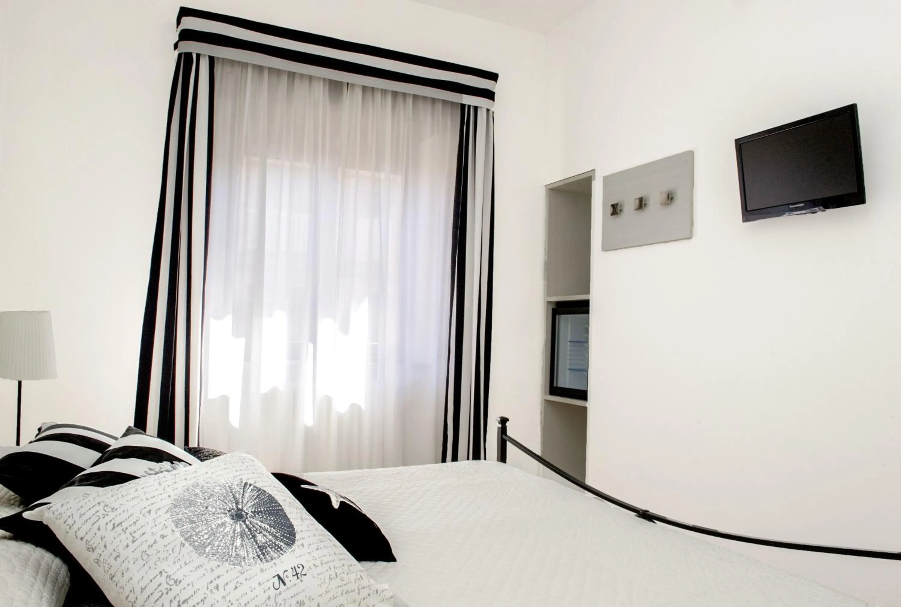 Decorative detail, Bed in Hotel Lucerna