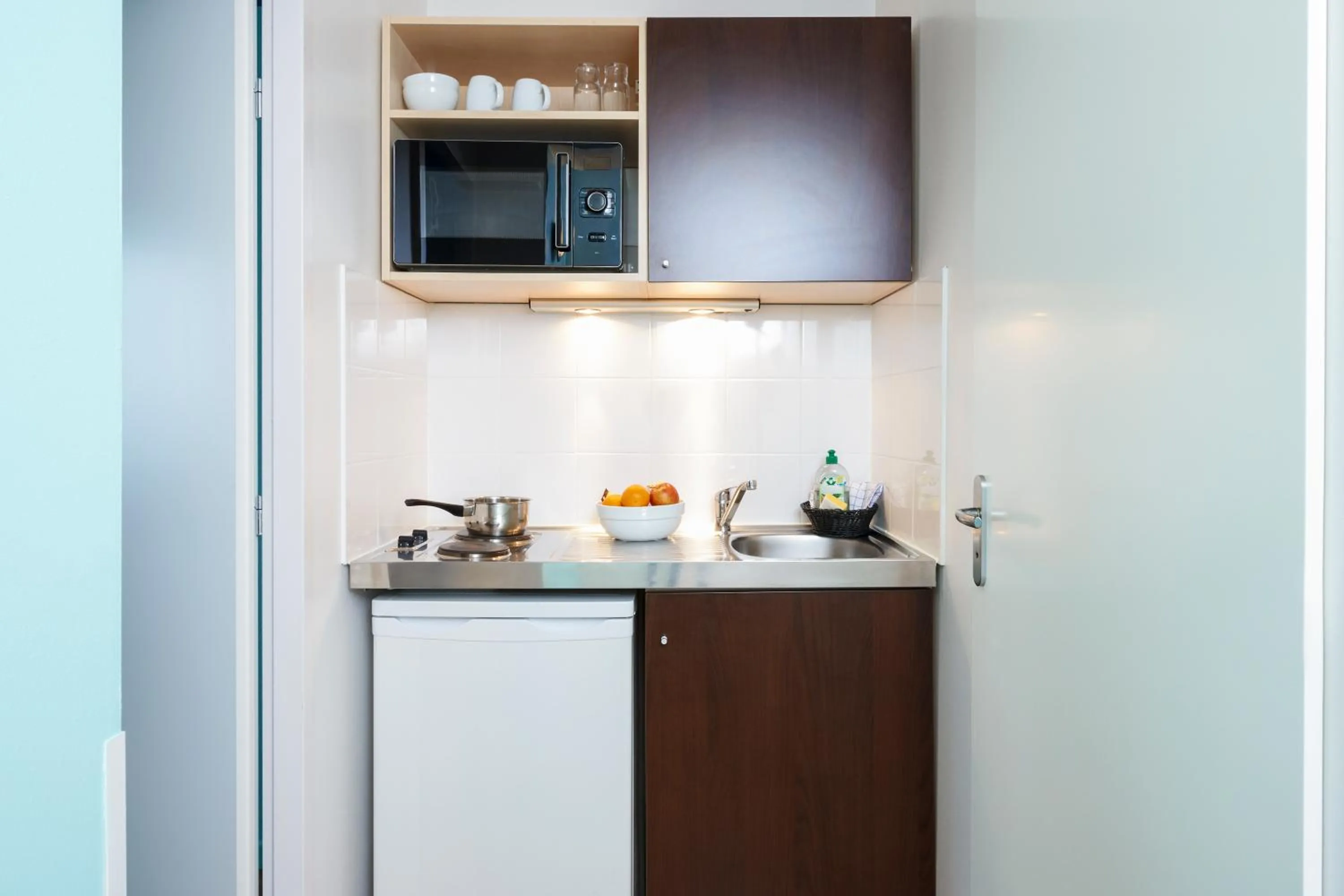 Kitchen or kitchenette in Aparthotel Adagio Access Strasbourg Illkirch