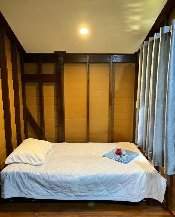 Bed in Najjamee Bungalows