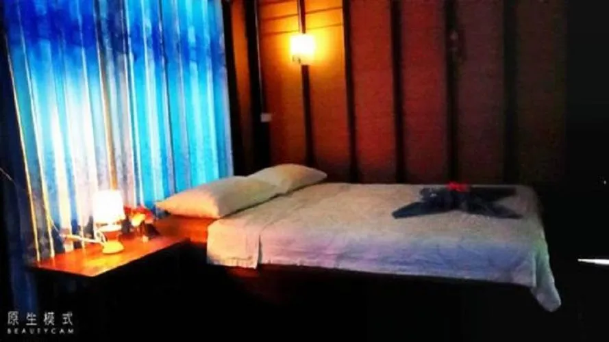 Bed in Najjamee Bungalows