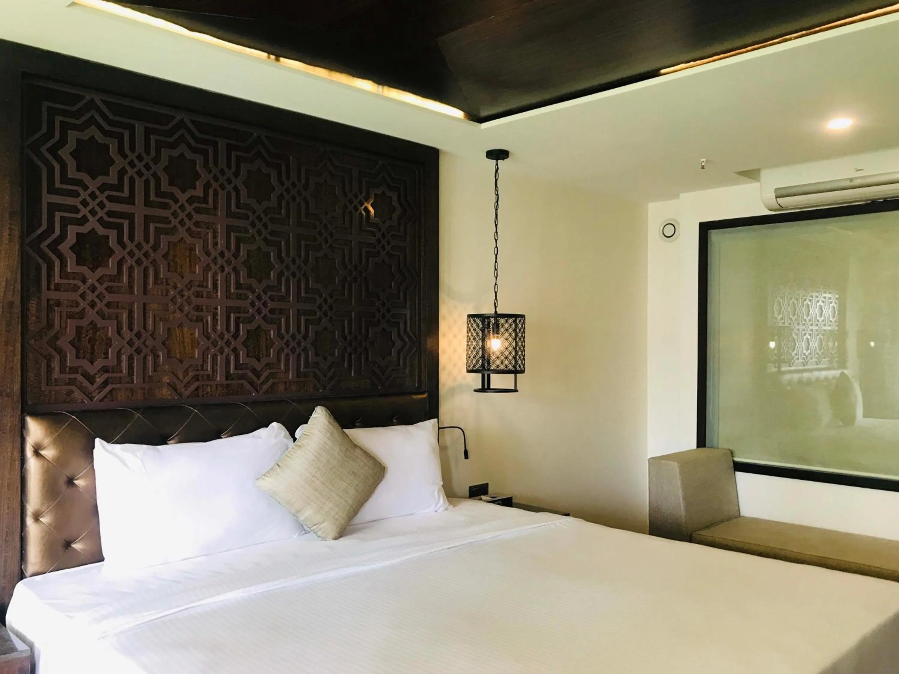 Bed in Silver Waves Resort & Spa - Daman