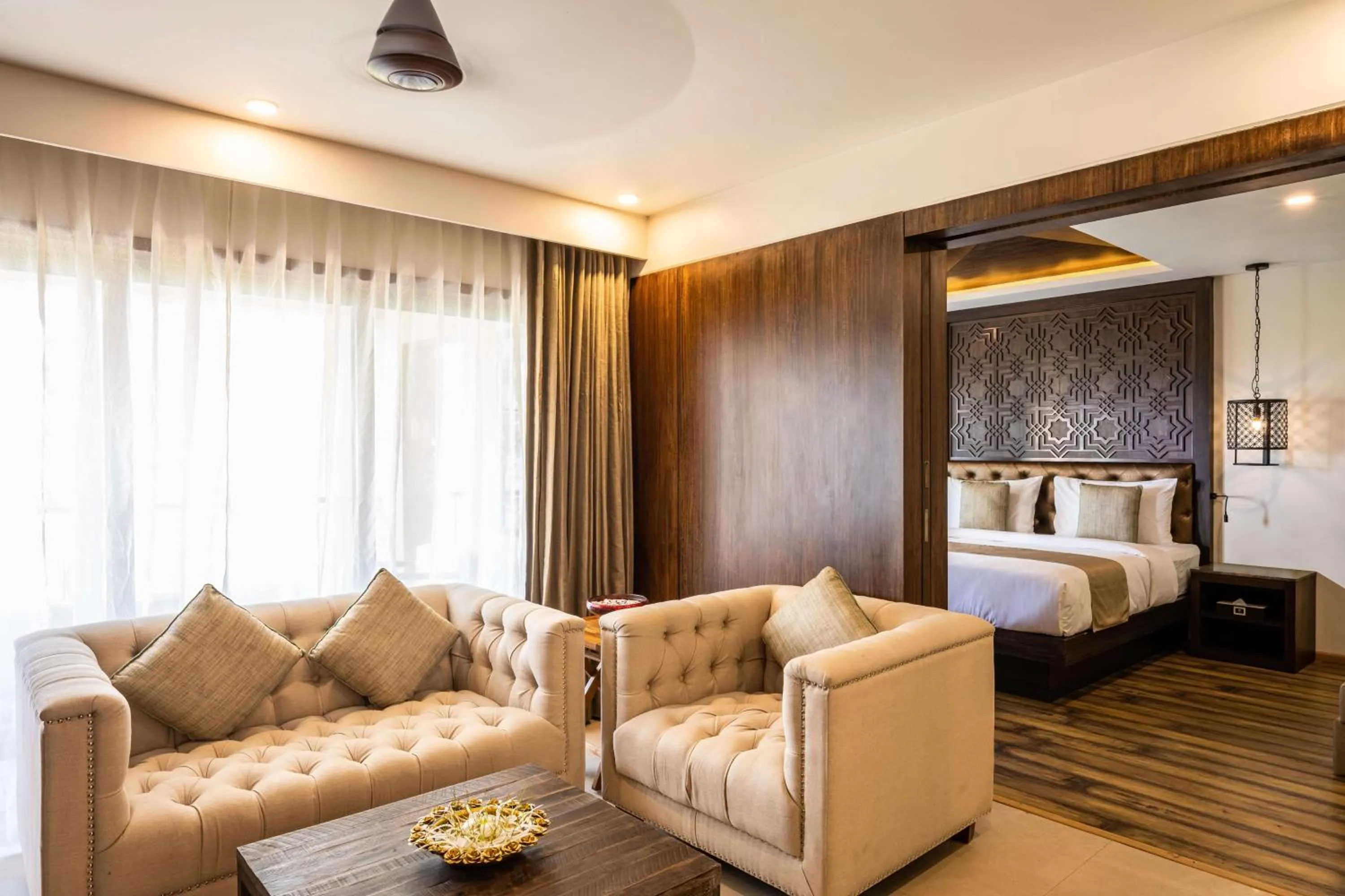 Living room, Bed in Silver Waves Resort & Spa - Daman